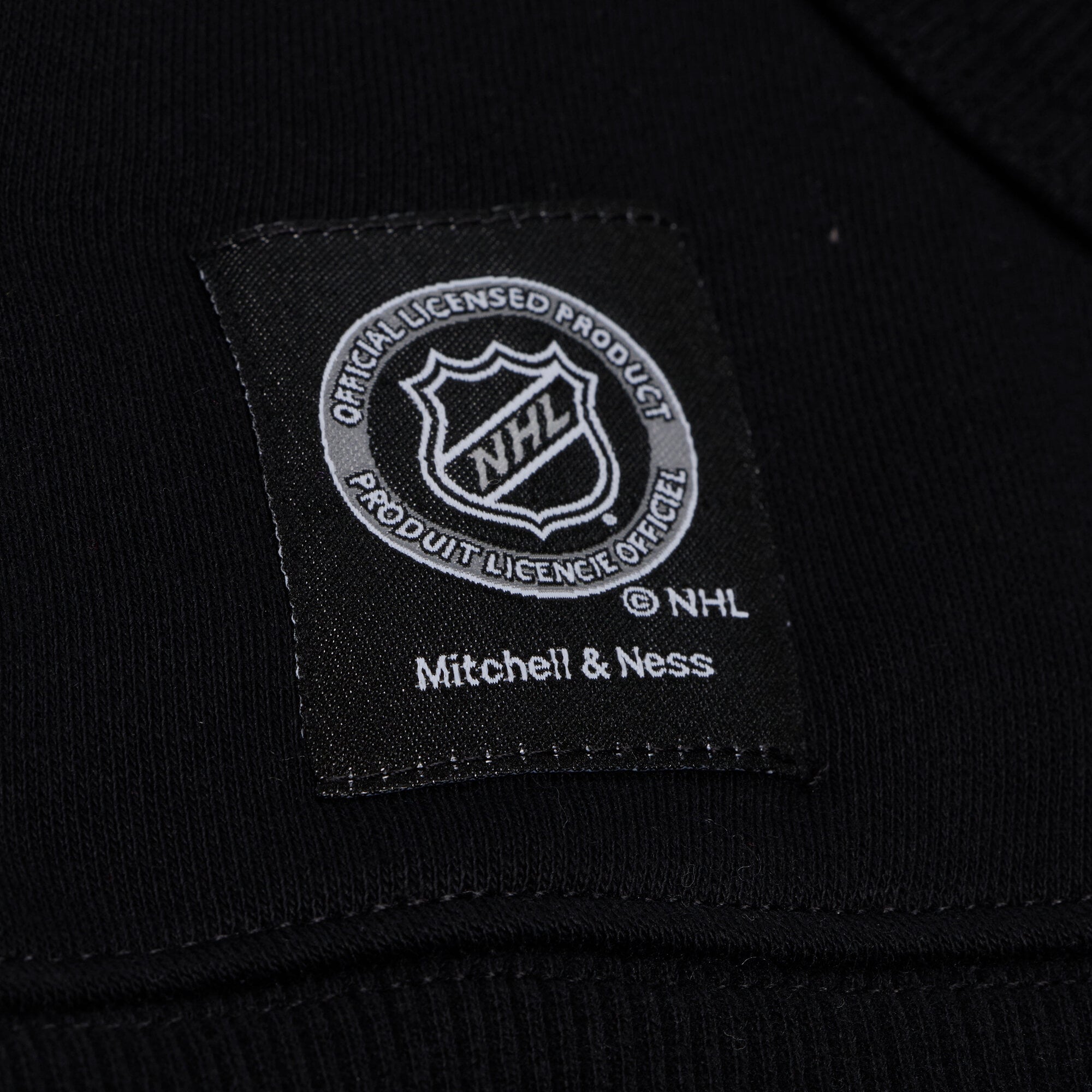 Sweat à capuche Mitchell & Ness blanc et noir pour femme, modèle Anaheim Ducks Head Coach