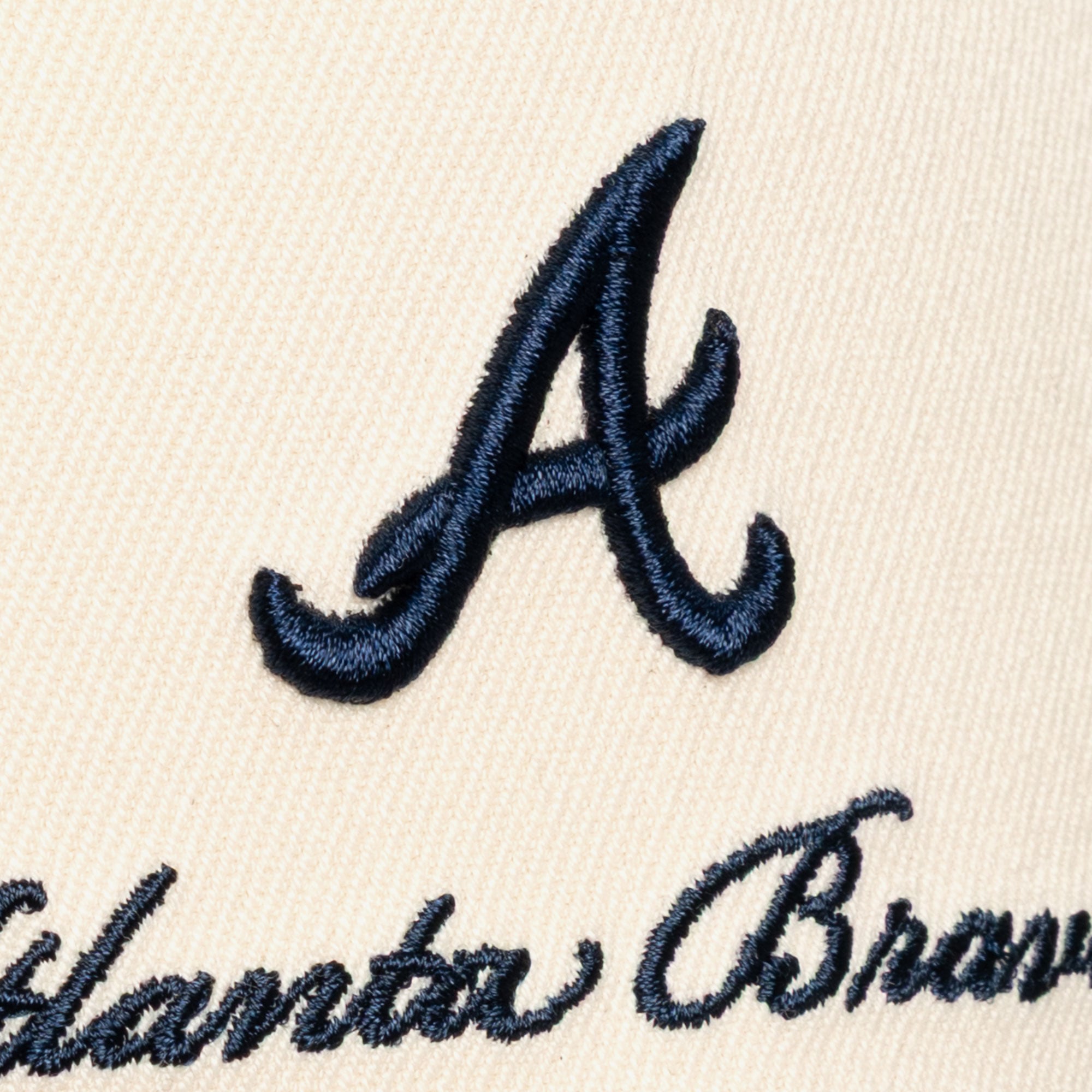 Men's Mitchell & Ness Cream/Navy Atlanta Braves Flawless Stretch-Snapback Hat
