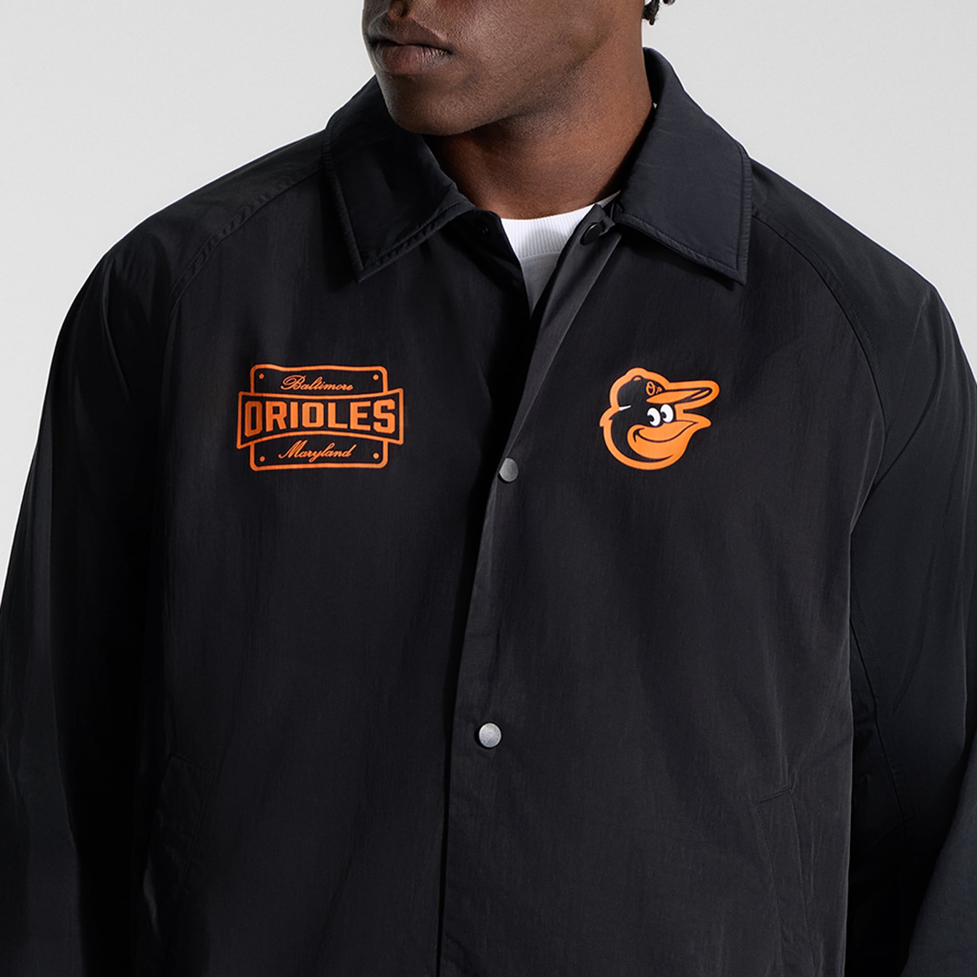 Veste de coach raglan noire Baltimore Orioles lululemon pour homme