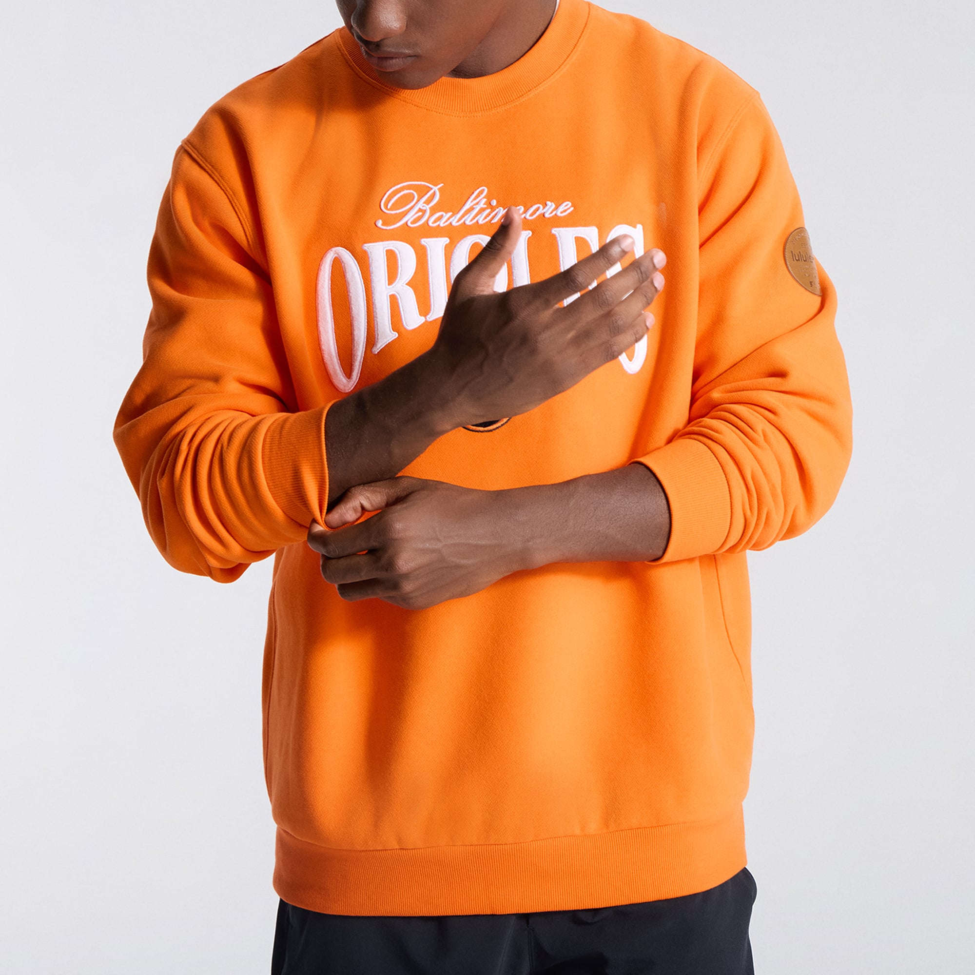 Men's lululemon Total Orange Baltimore Orioles Steady State Sweatshirt