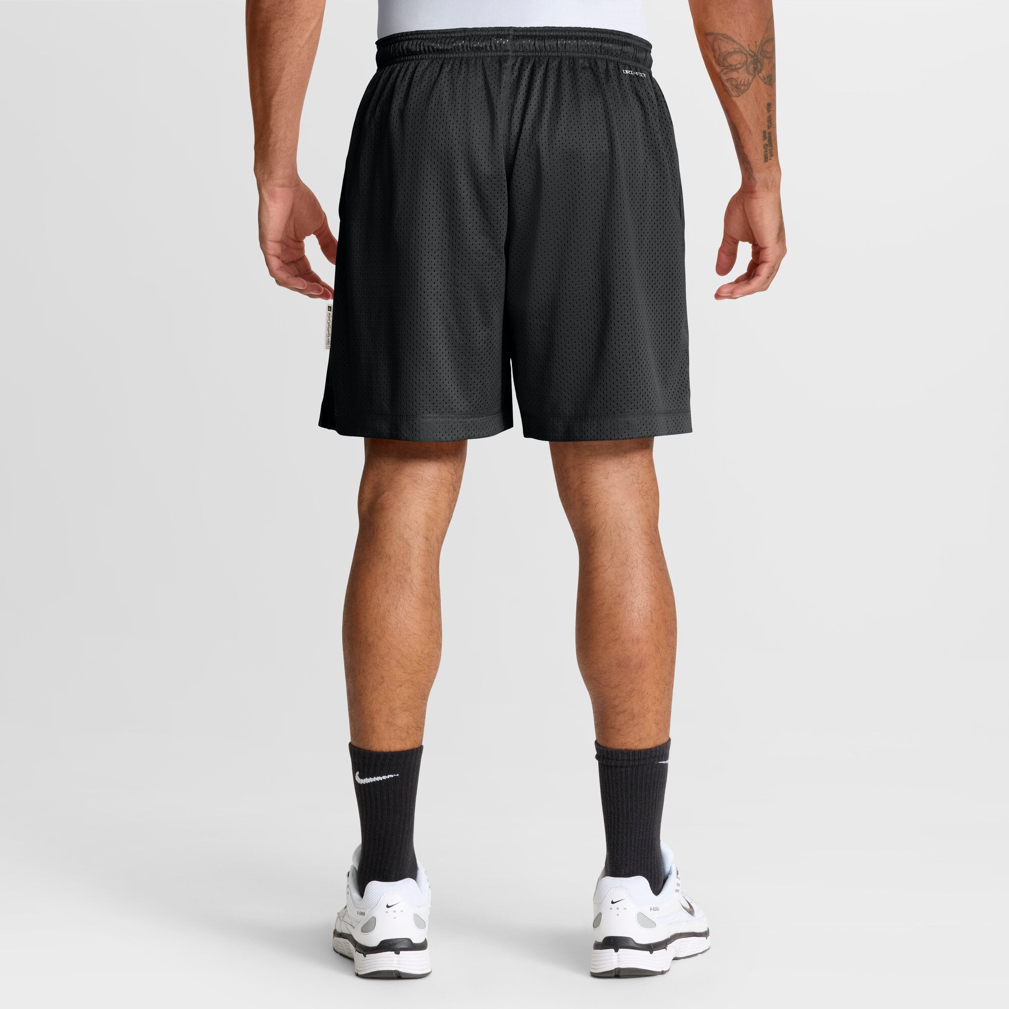 Short réversible Nike Sideline Standard Issue Dri-FIT noir/platine pour homme, modèle Baltimore Ravens.