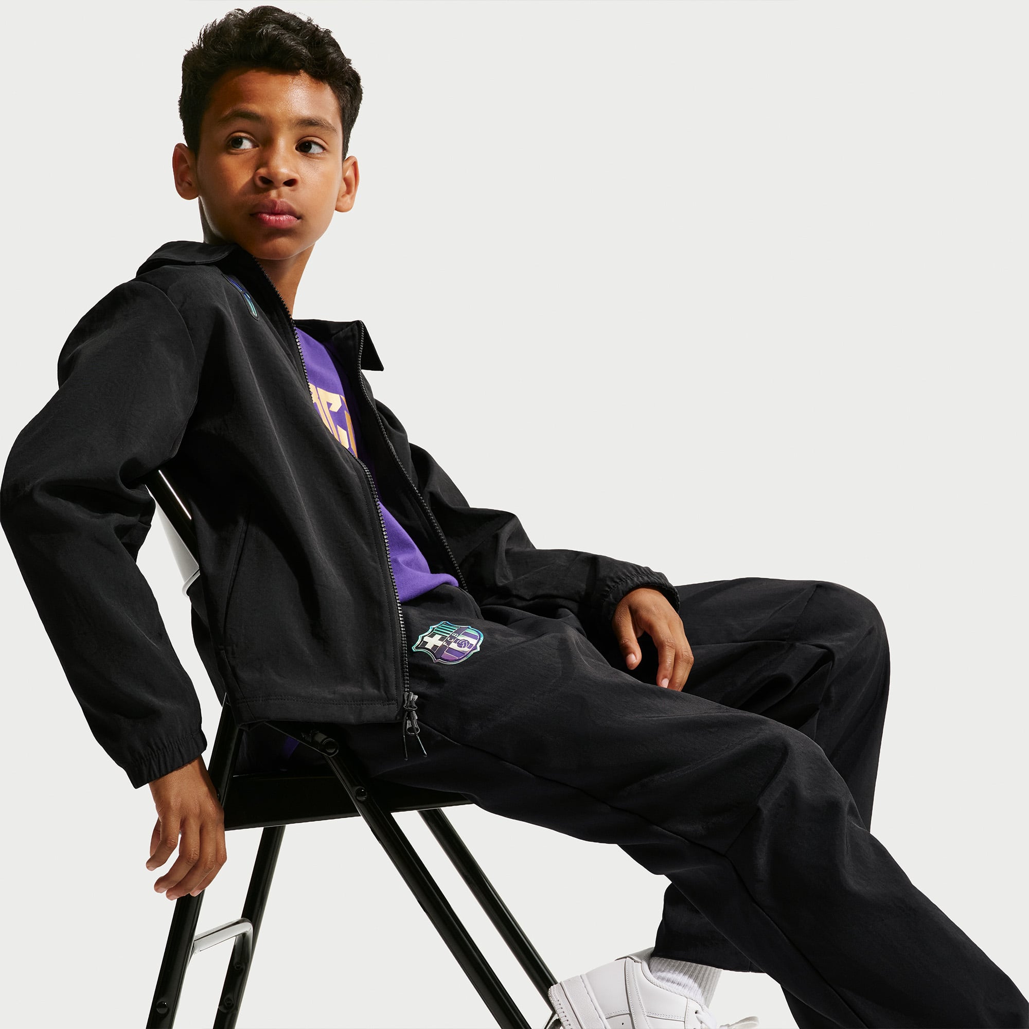 Pantalon tissé extérieur Nike FC Barcelone noir pour enfant (saison 2026/27)