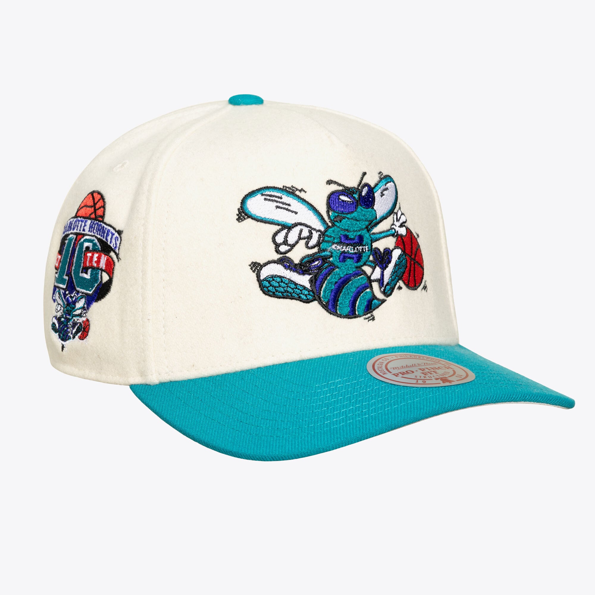 Casquette unisexe Mitchell & Ness crème Charlotte Hornets Team Pro ajustable