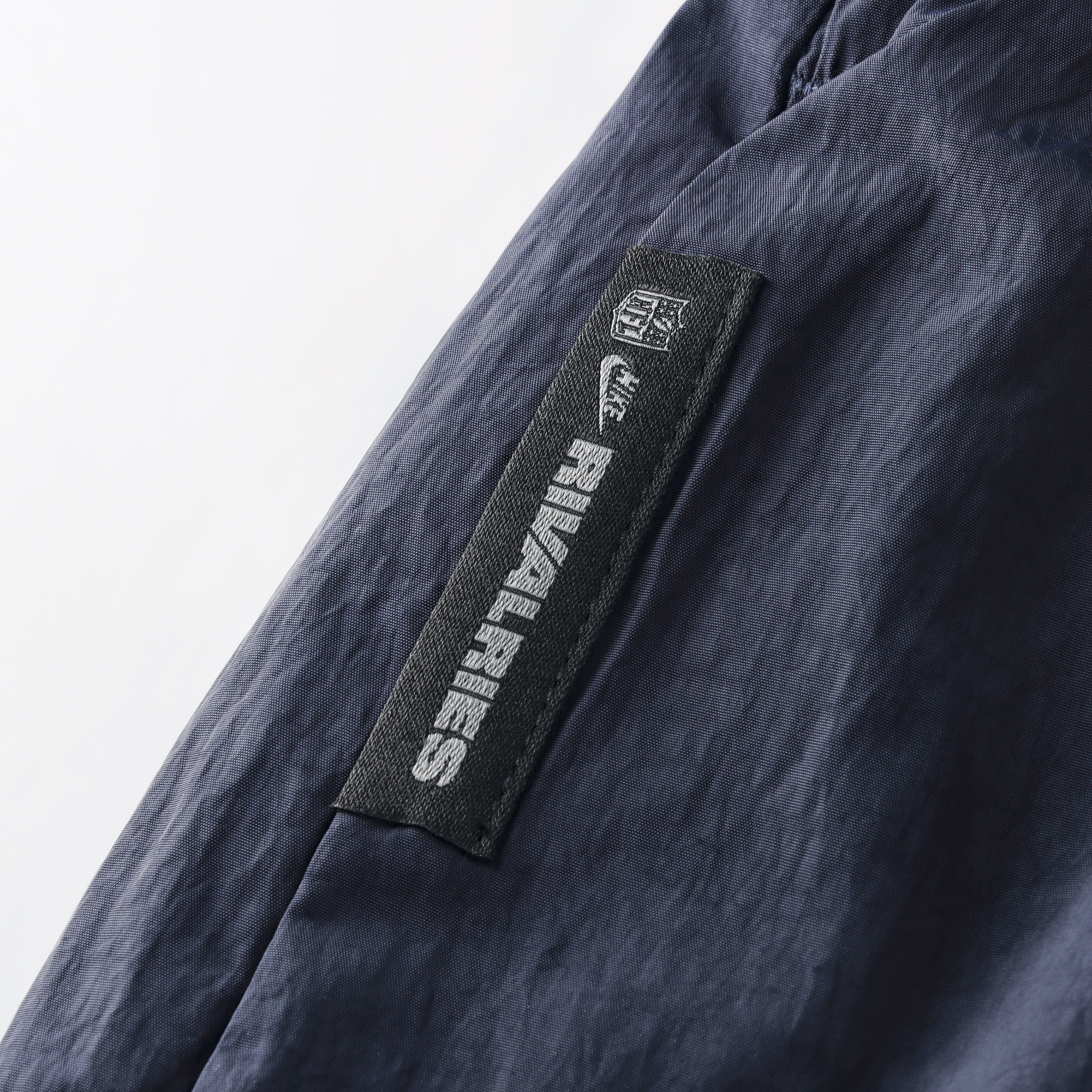 Pantalon tissé à jambes larges Nike Chicago Bears 2026 Rivalries Collection pour femmes, bleu marine