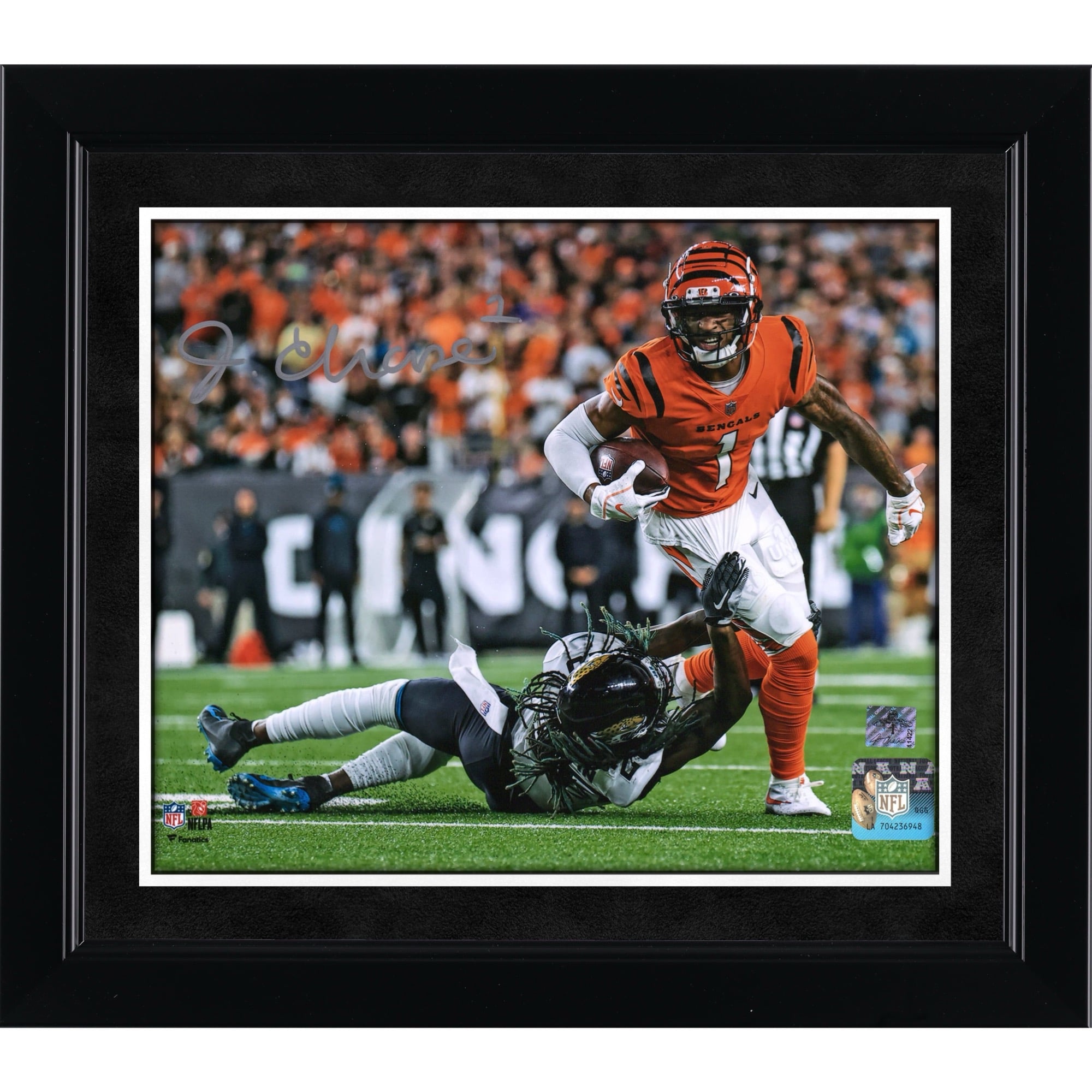 Ja'Marr Chase Cincinnati Bengals Autographed 8" x 10" Breaking Tackle Photograph