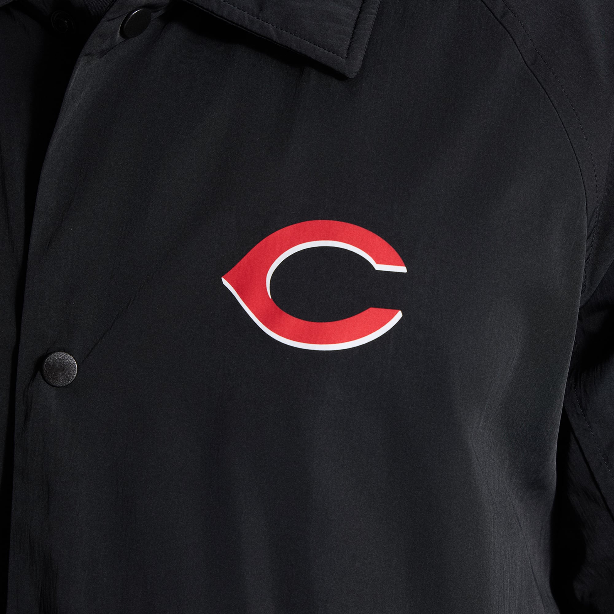 Veste d'entraîneur raglan noire Cincinnati Reds de lululemon pour homme