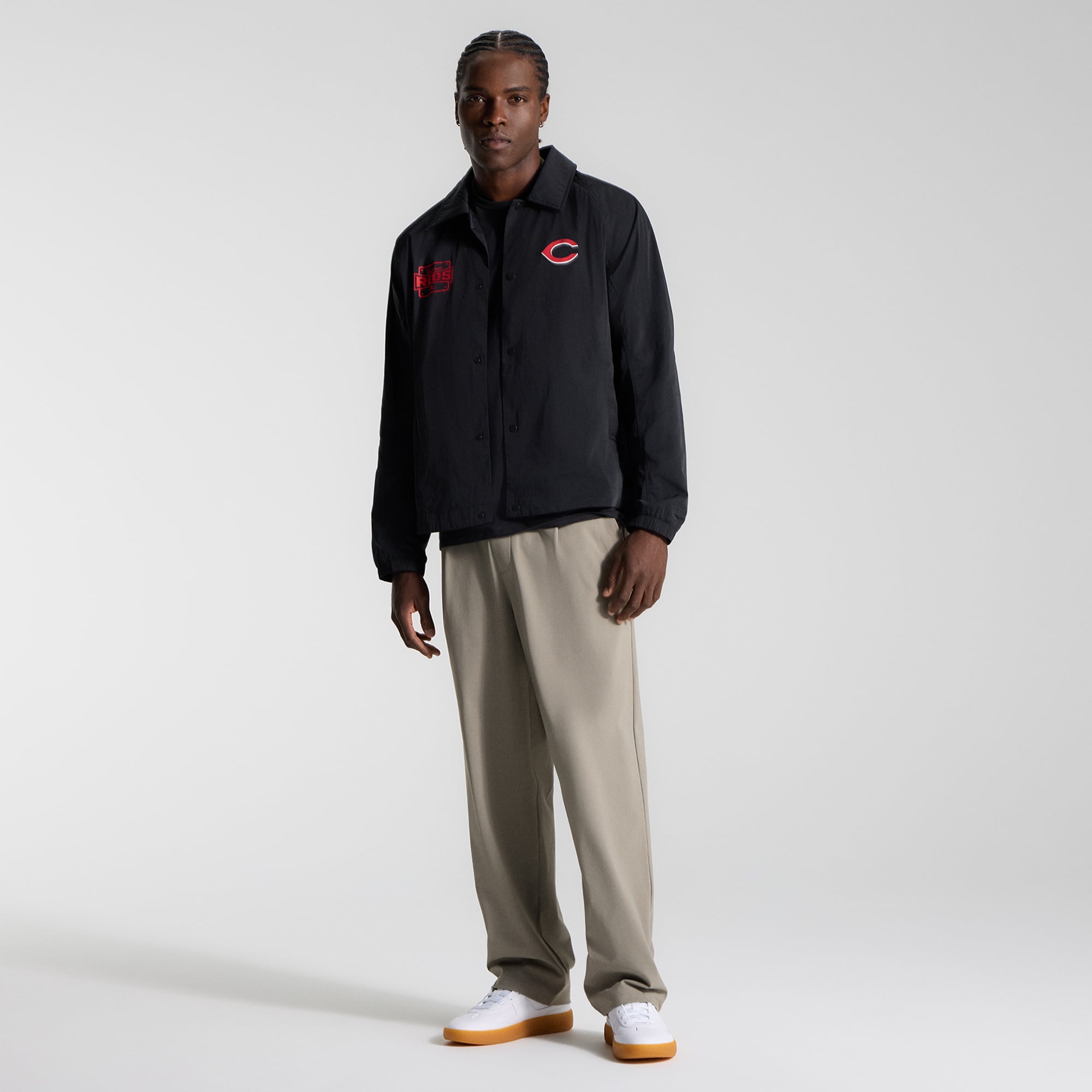 Veste d'entraîneur raglan noire Cincinnati Reds de lululemon pour homme