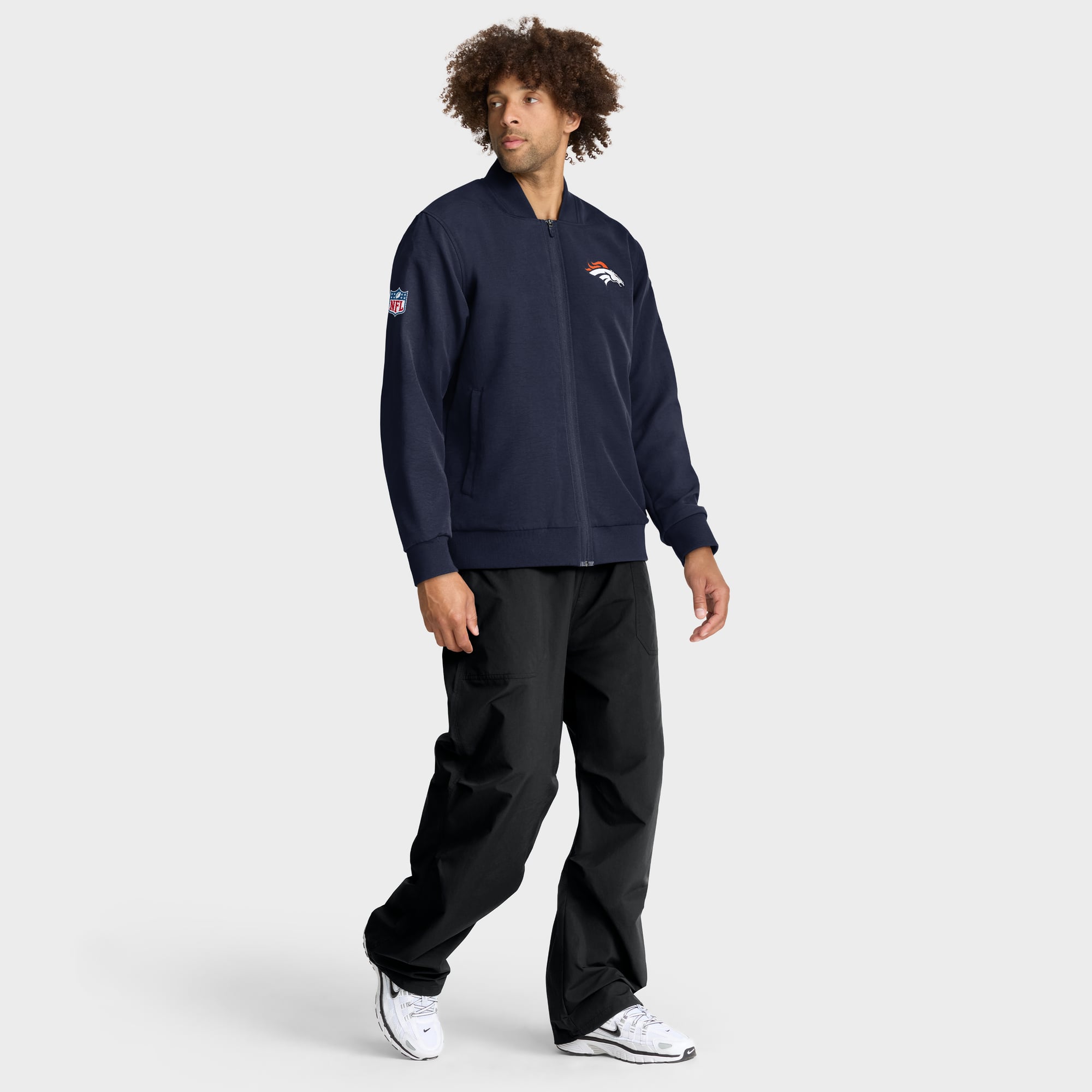 Veste bomber zippée Nike Dri-FIT pour homme, bleu marine, Denver Broncos, modèle Sideline Powerful Blocking.