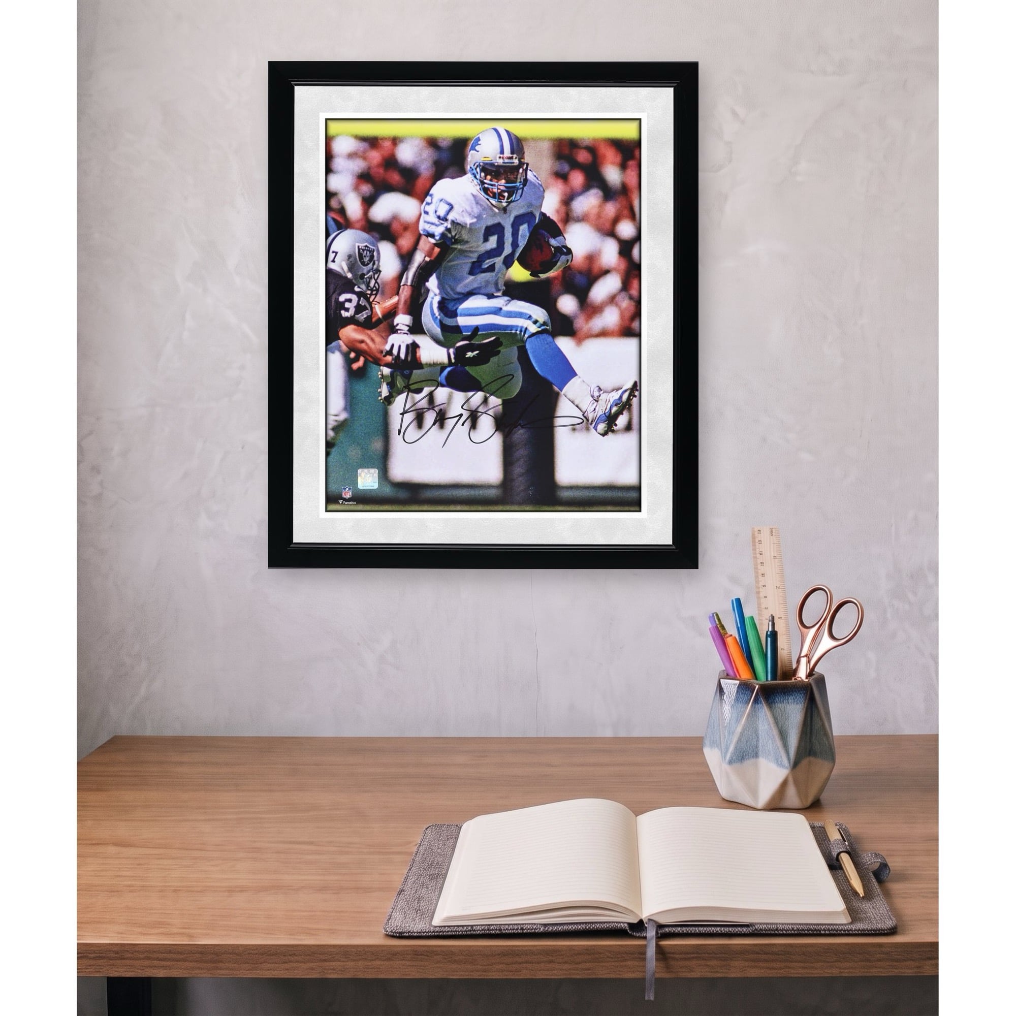 Barry Sanders Detroit Lions Autographed 16" x 20" Hurdle vs. Raiders Photograph