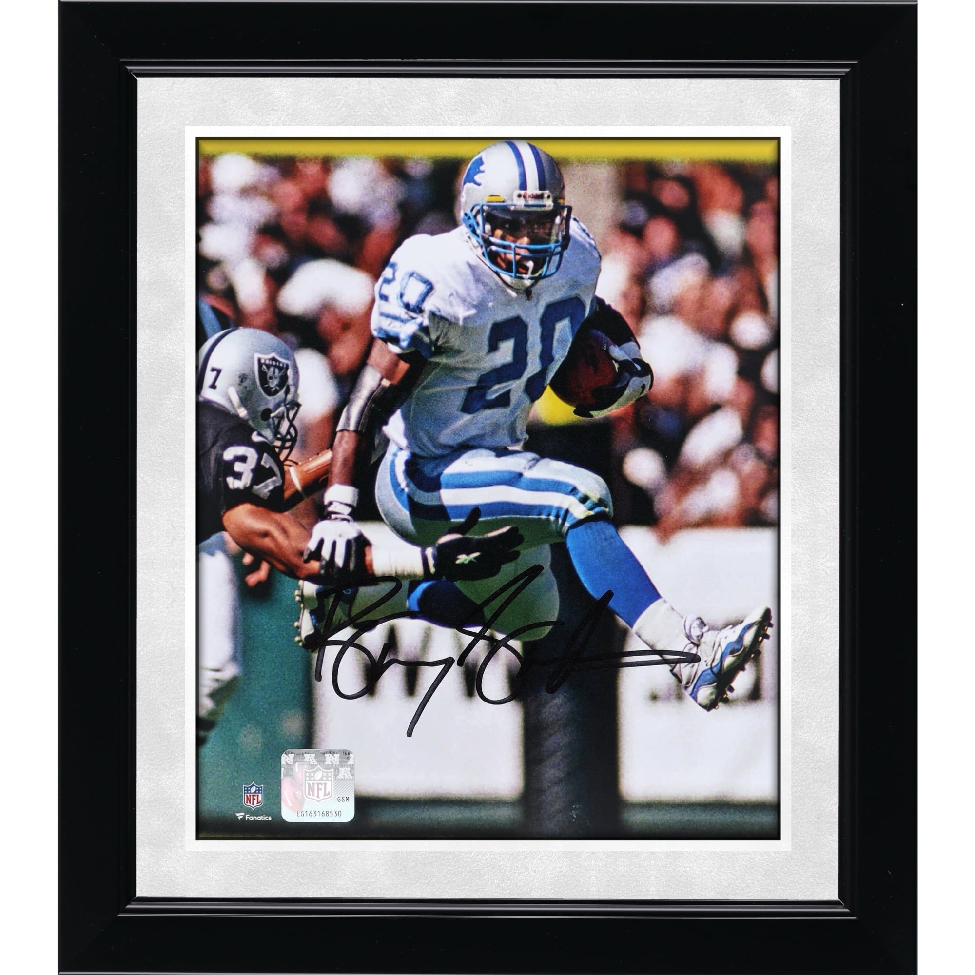 Photo dédicacée de Barry Sanders (Detroit Lions) - Match de haies contre les Raiders (8" x 10")