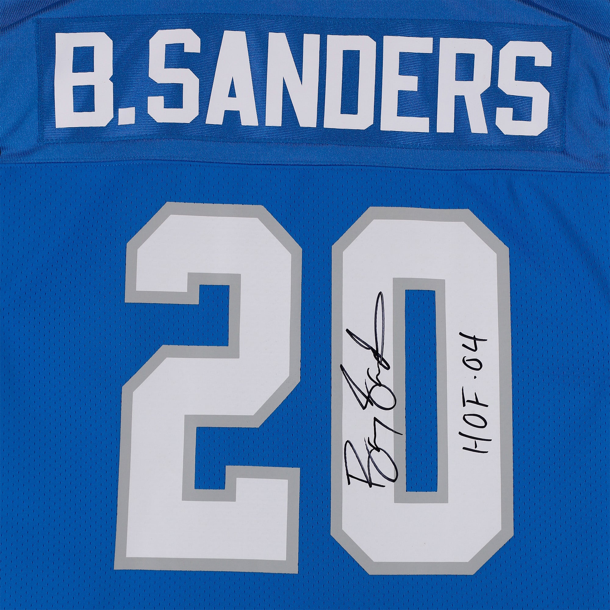 Maillot authentique bleu Mitchell & Ness 1991 autographié par Barry Sanders des Detroit Lions, avec inscription « HOF 04 ».