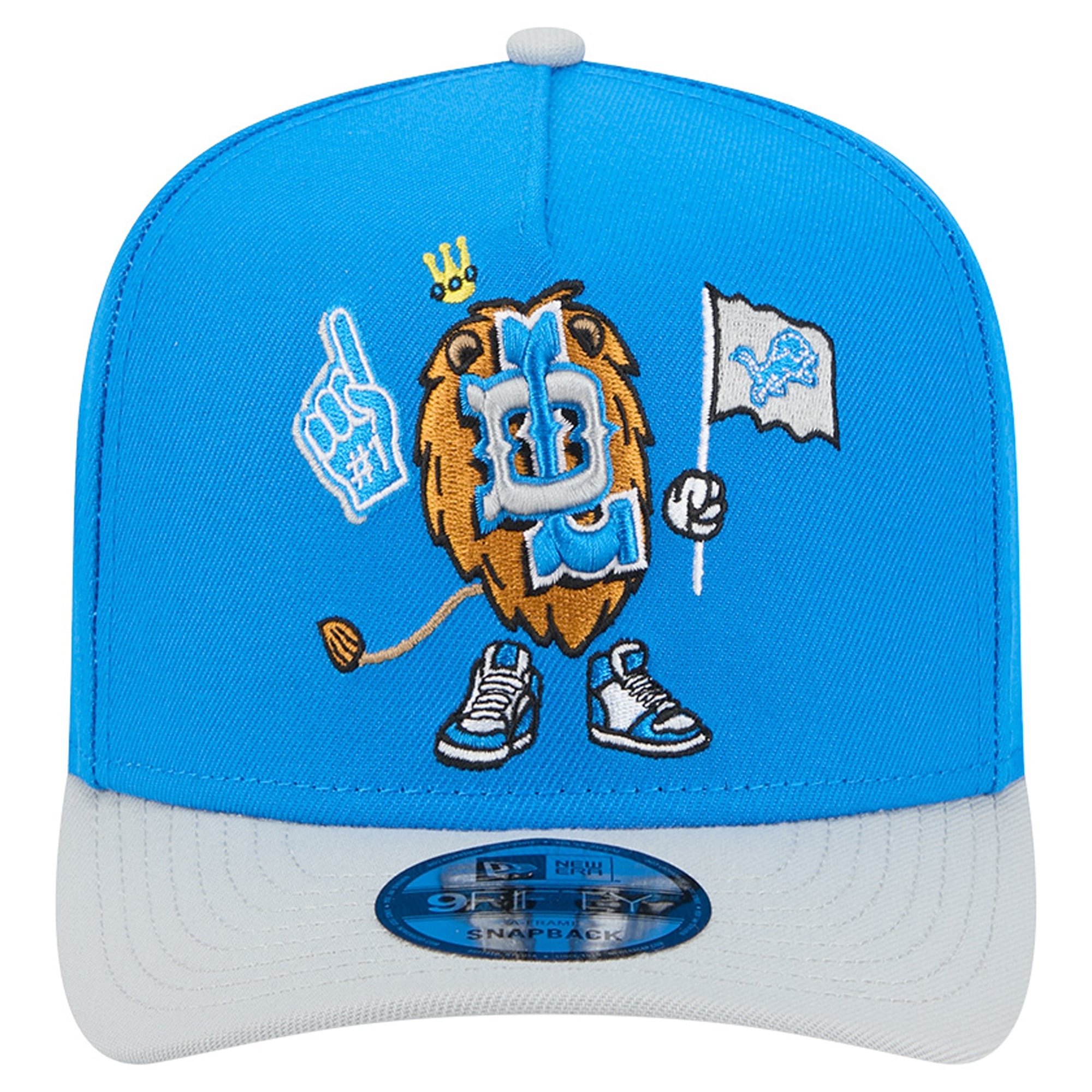 Casquette snapback New Era 9FIFTY pour homme, bleue et argentée, motif Detroit Lions, style dessin animé.