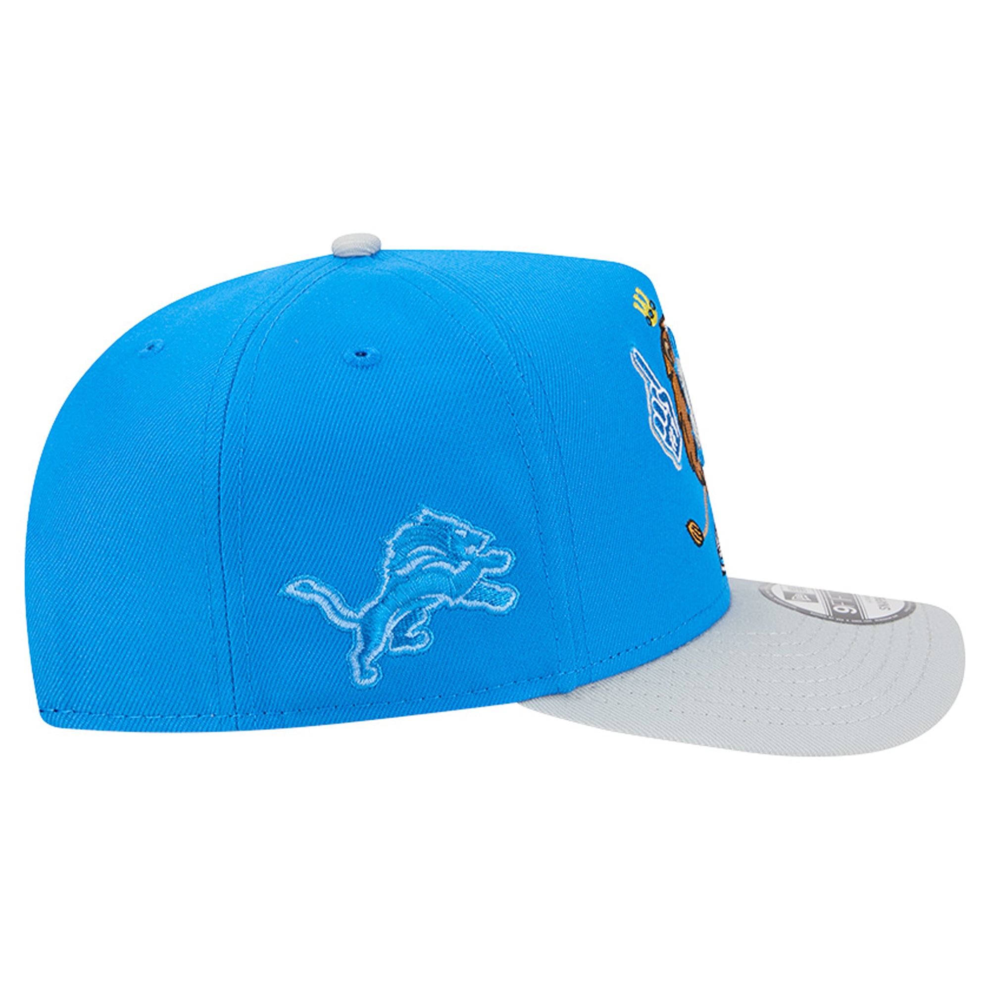 Casquette snapback New Era 9FIFTY pour homme, bleue et argentée, motif Detroit Lions, style dessin animé.