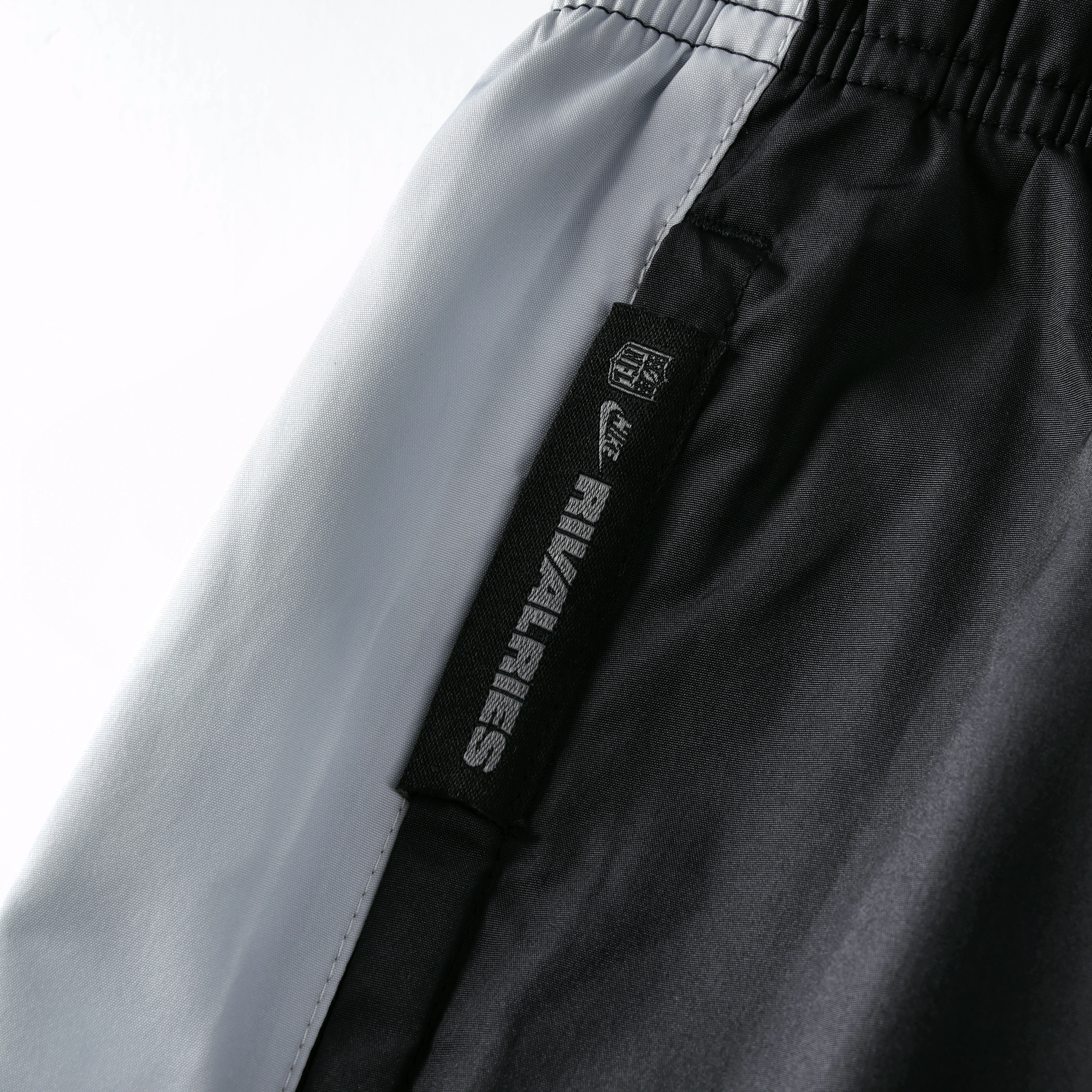 Pantalon coupe-vent Nike Detroit Lions Collection 2026 Rivalries pour homme, noir