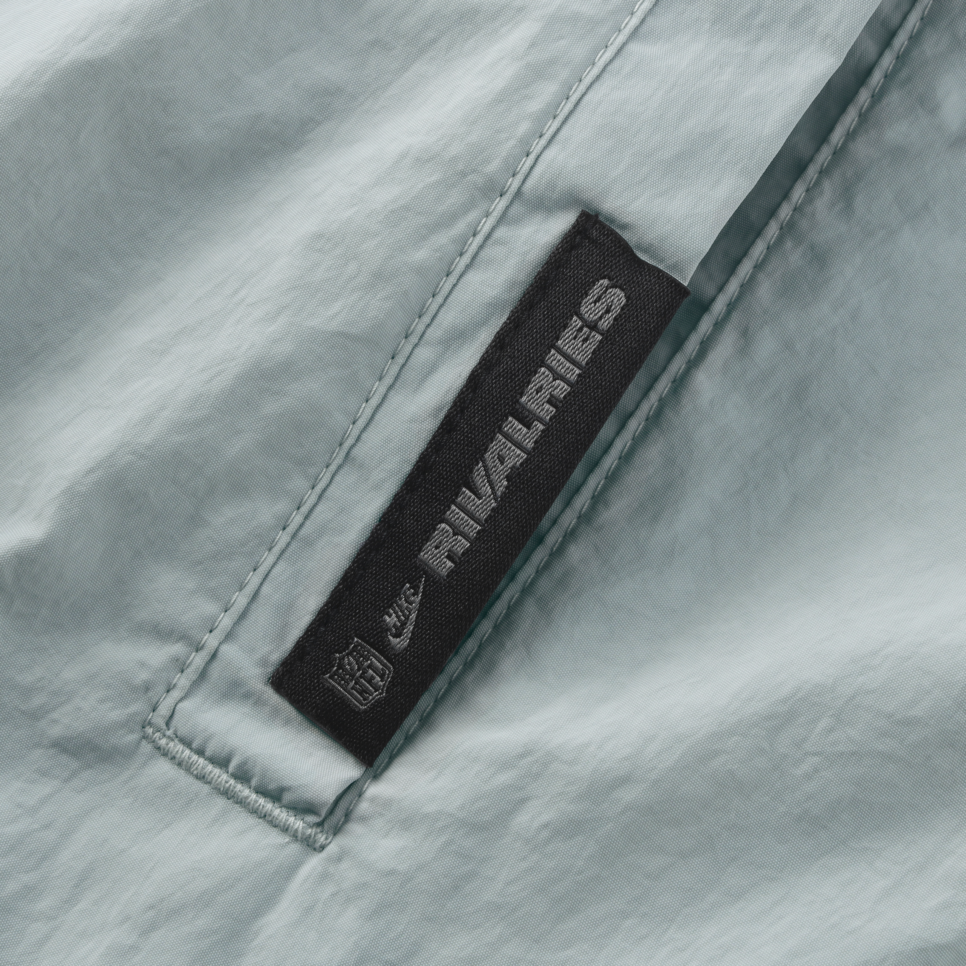 Veste zippée oversize Nike Detroit Lions Collection 2026 Rivalries pour femme, noire et grise