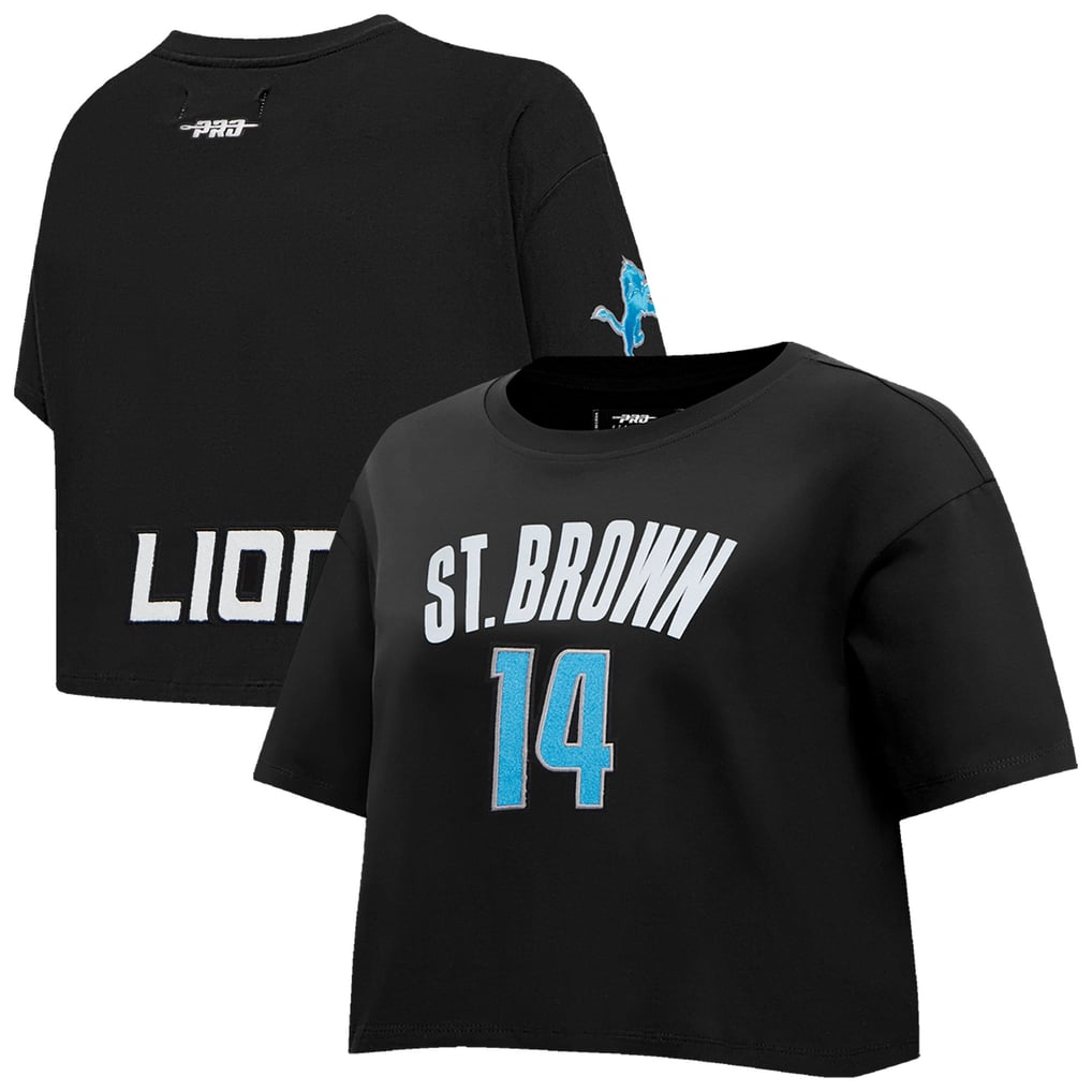 T-shirt court et boxy pour femme Amon-Ra St. Brown Detroit Lions Pro Standard avec nom et numéro de joueur - Noir