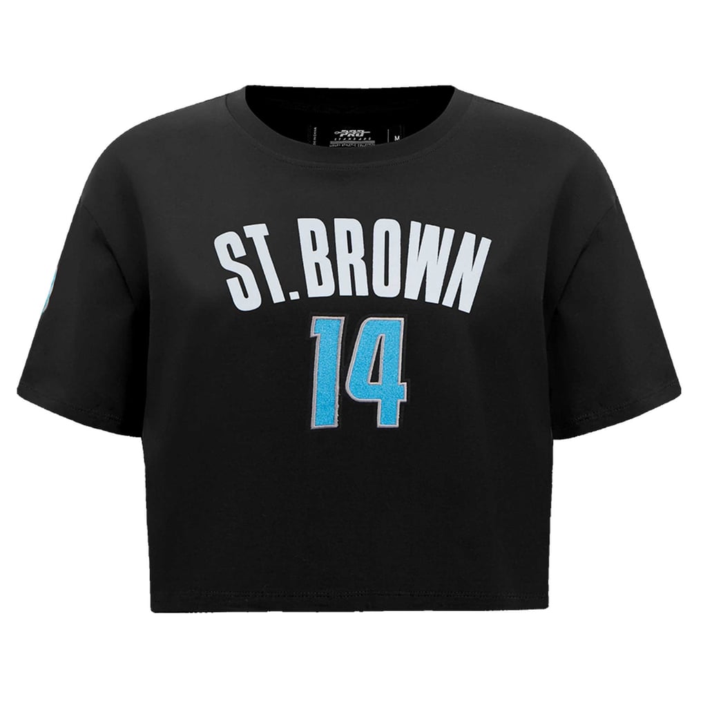 T-shirt court et boxy pour femme Amon-Ra St. Brown Detroit Lions Pro Standard avec nom et numéro de joueur - Noir