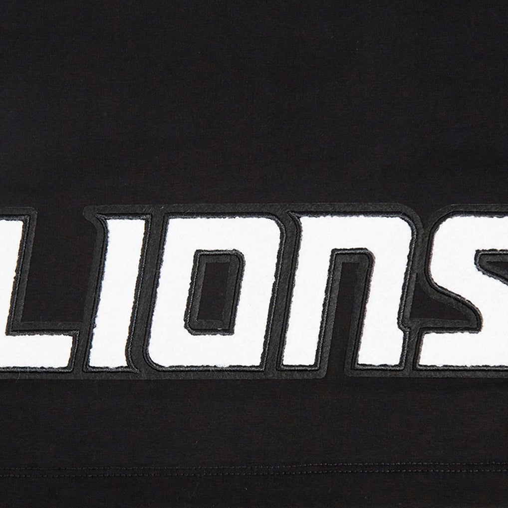 T-shirt court et boxy pour femme Amon-Ra St. Brown Detroit Lions Pro Standard avec nom et numéro de joueur - Noir