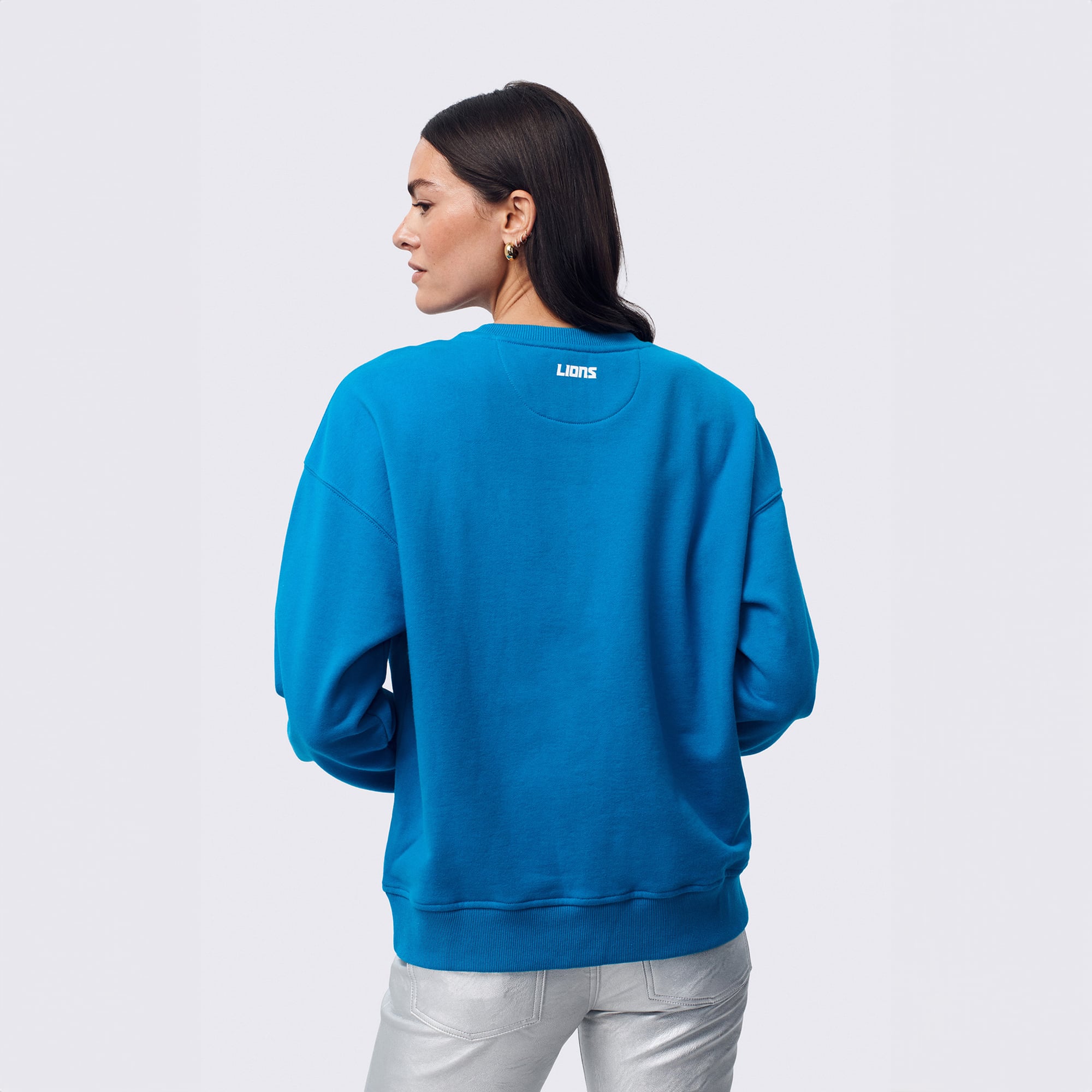 Sweat-shirt à capuche Terez bleu Detroit Lions pour femme, orné d'un logo en pierre précieuse.