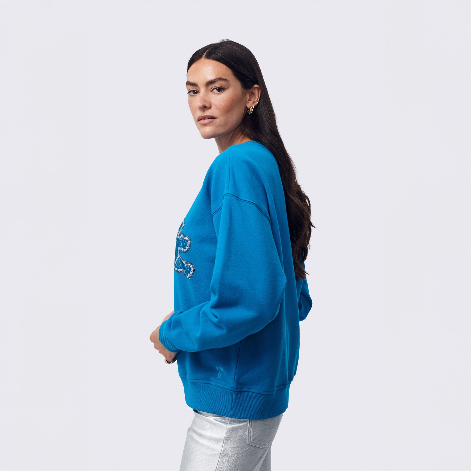 Sweat-shirt à capuche Terez bleu Detroit Lions pour femme, orné d'un logo en pierre précieuse.