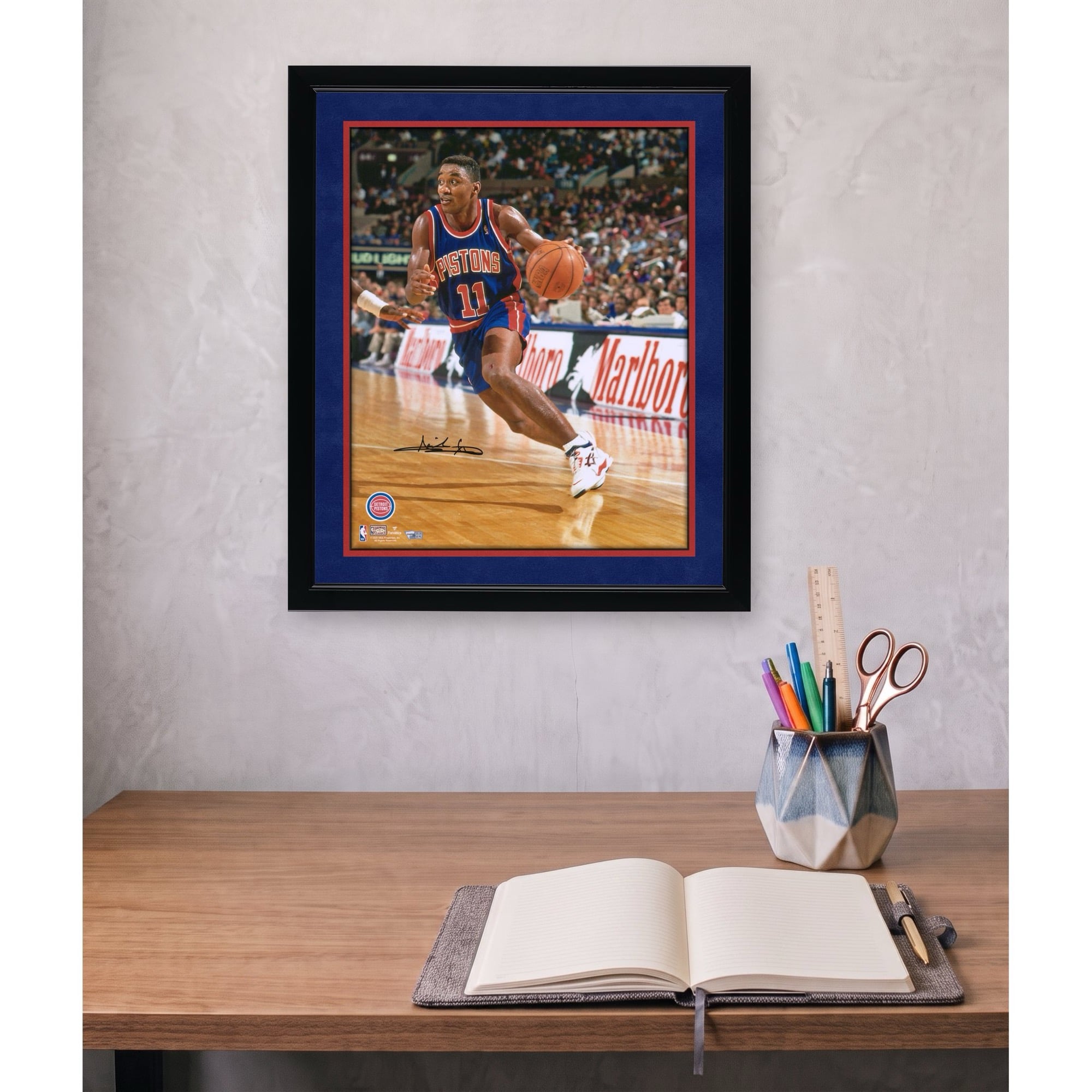 Isiah Thomas Detroit Pistons Autographed 16" x 20" Driving in Blue Jersey Photograph