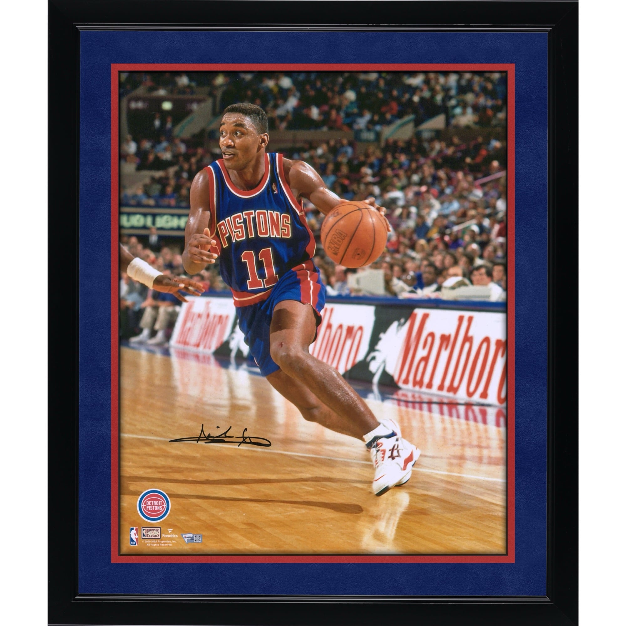 Isiah Thomas Detroit Pistons Autographed 16" x 20" Driving in Blue Jersey Photograph