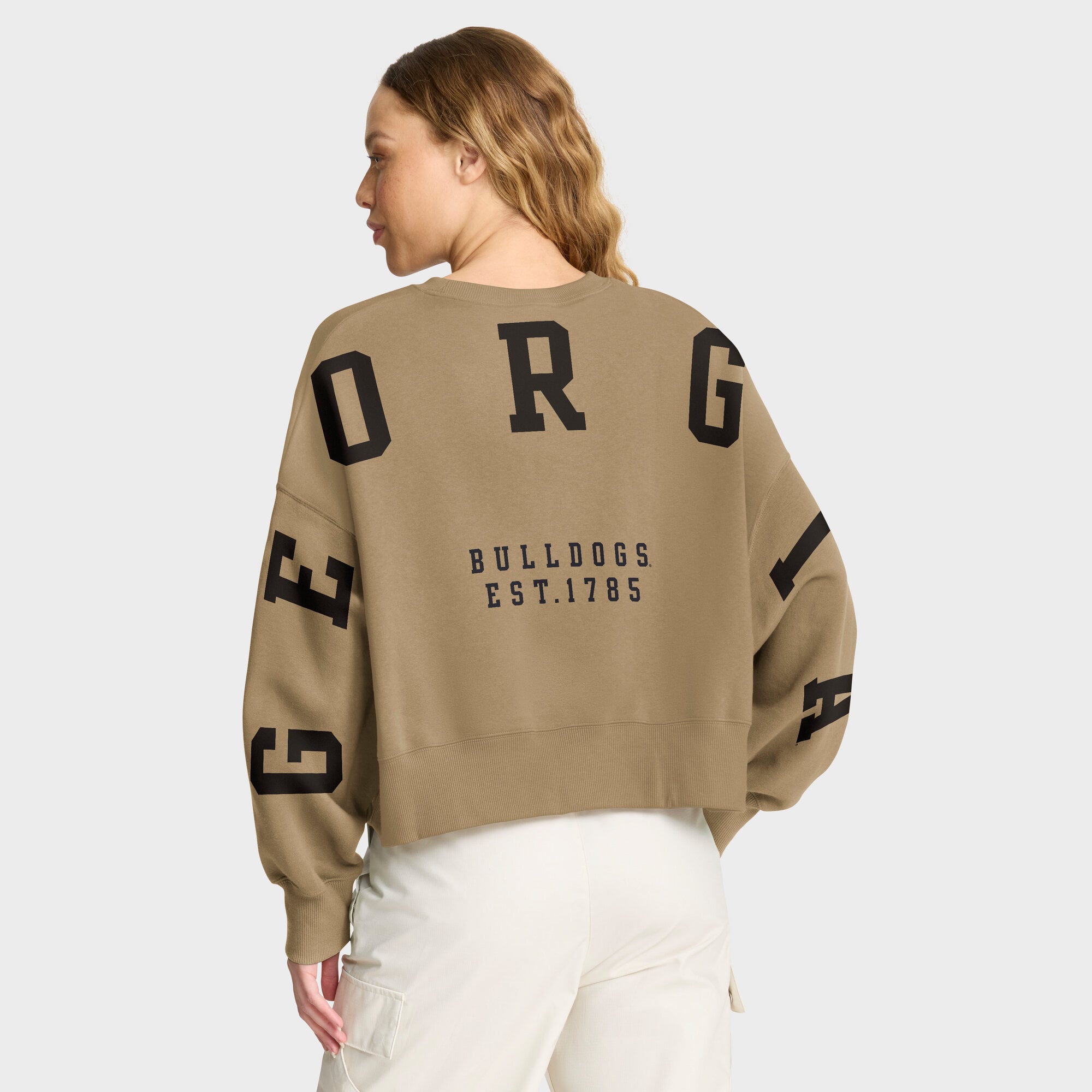 Sweat-shirt oversize Nike Georgia Bulldogs Phoenix pour femme, couleur beige.