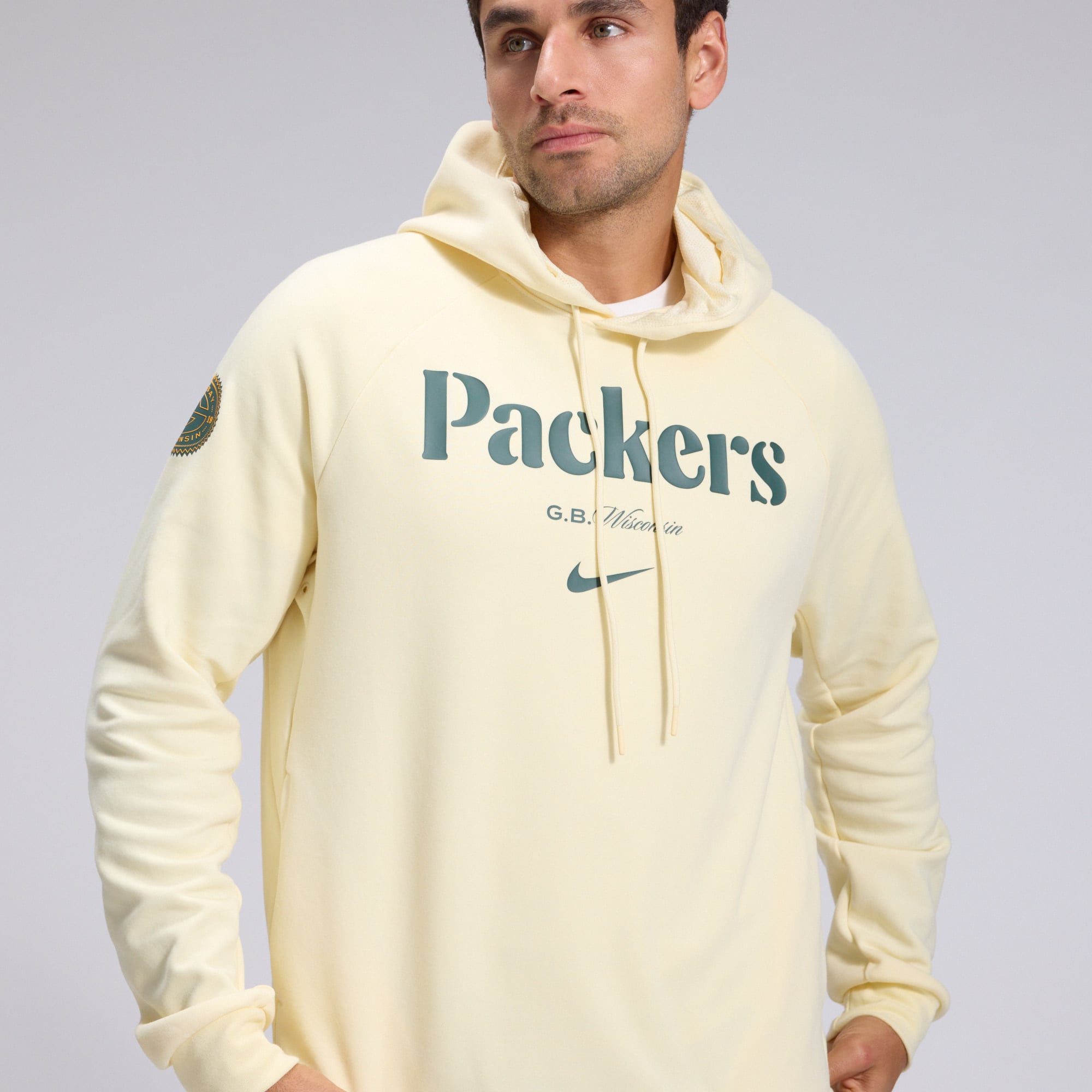 Men's Nike  Cream Green Bay Packers 2026 Rivalries Collection Dri-FIT Pullover Hoodie