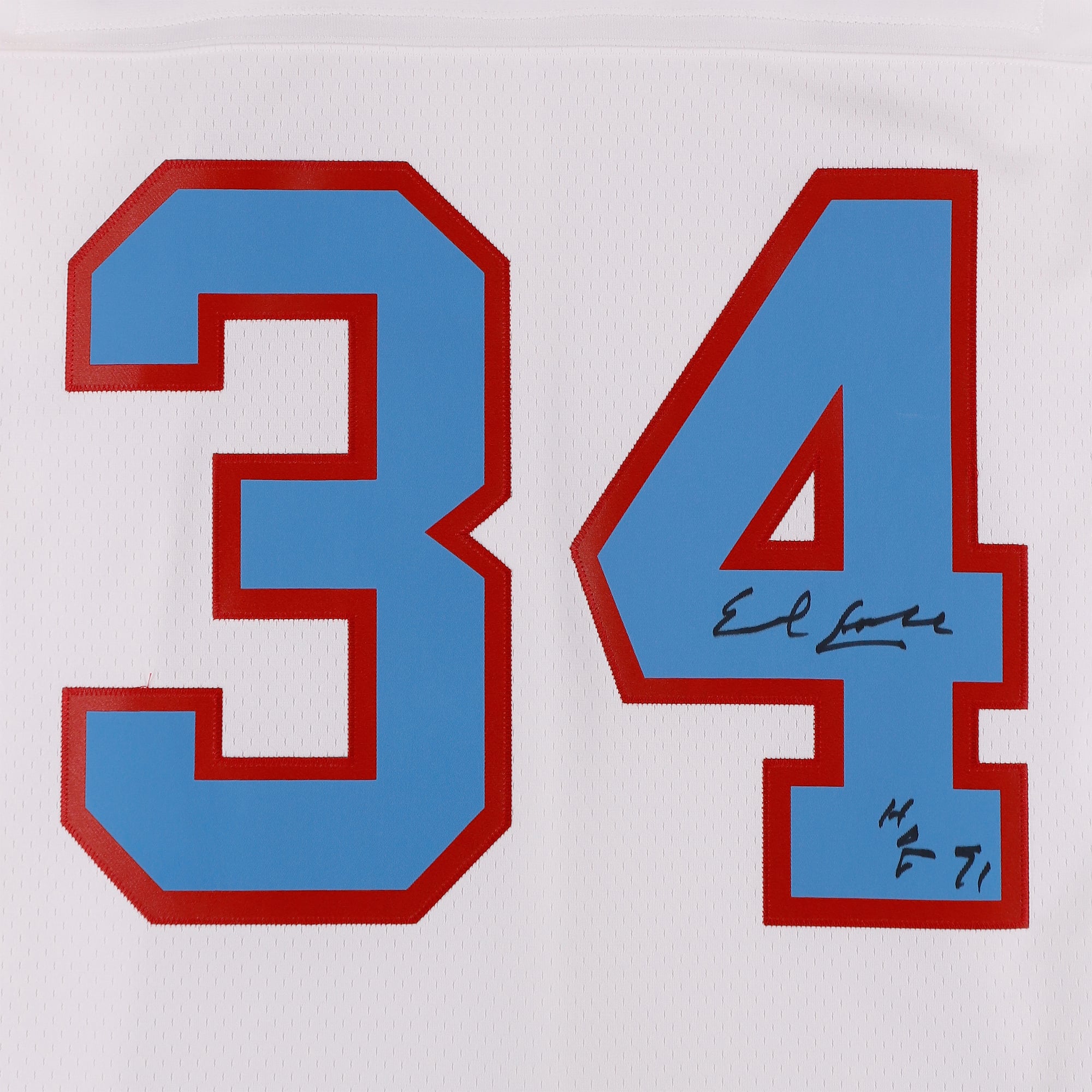 Maillot réplique blanc Nike Mitchell & Ness 1979 autographié par Earl Campbell des Houston Oilers, avec inscription « HOF 91 ».