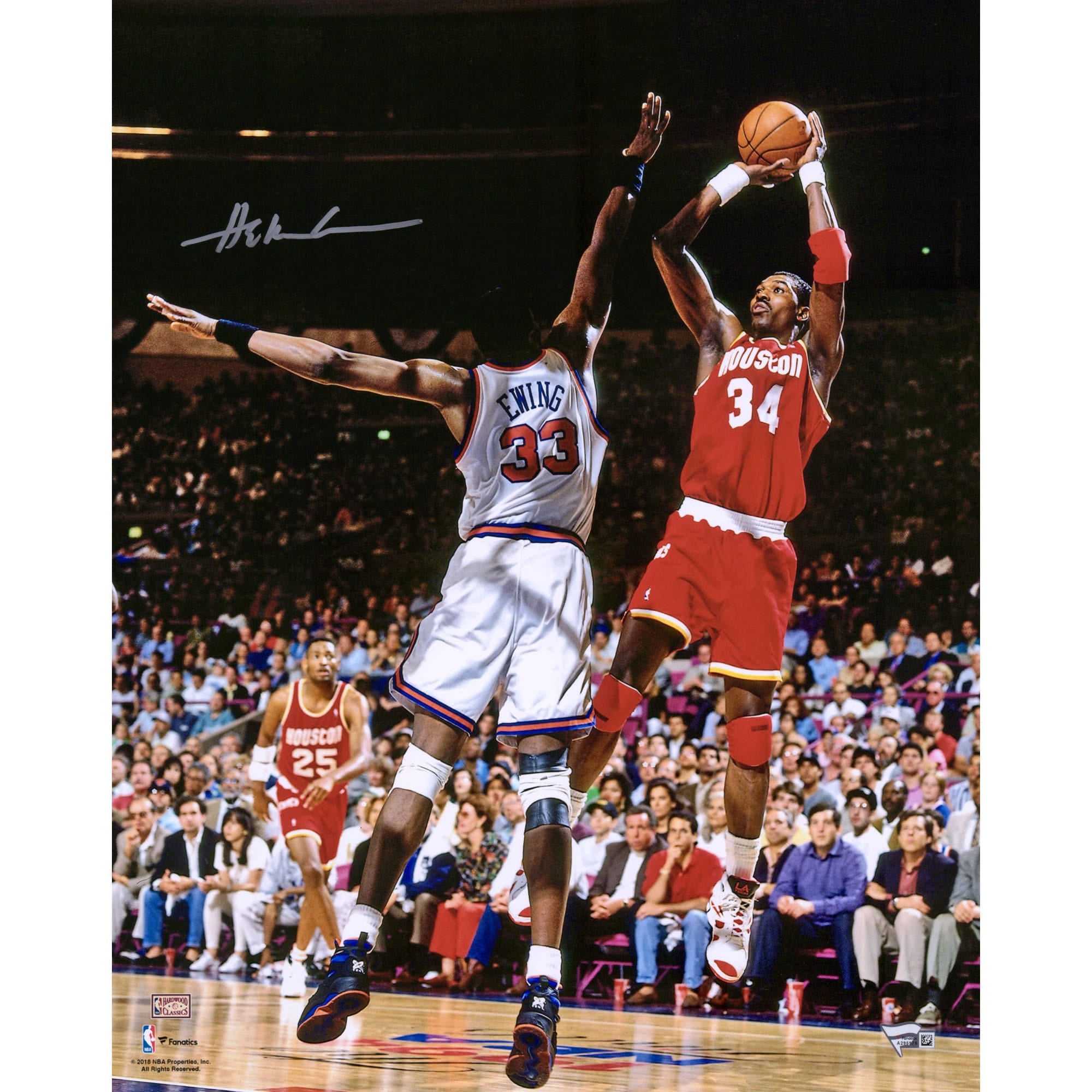 Photo de Hakeem Olajuwon (Houston Rockets) en plein saut, dédicacée par un joueur des Rockets de Houston (40,6 x 50,8 cm).