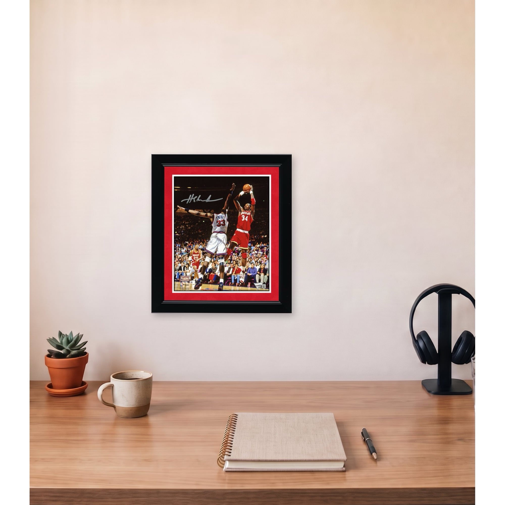 Hakeem Olajuwon Houston Rockets Autographed 8" x 10" Jumping Photograph