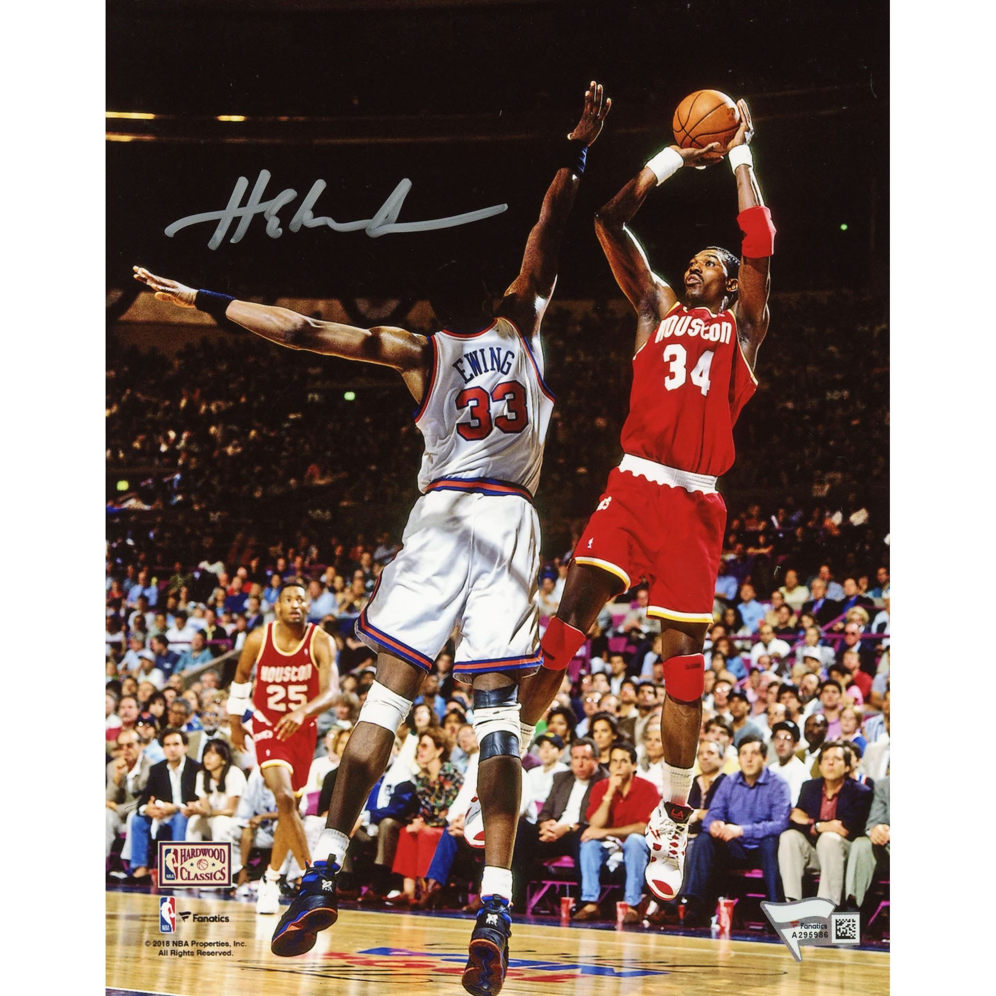 Photo de saut autographiée de Hakeem Olajuwon (Houston Rockets), format 8 x 10 pouces.