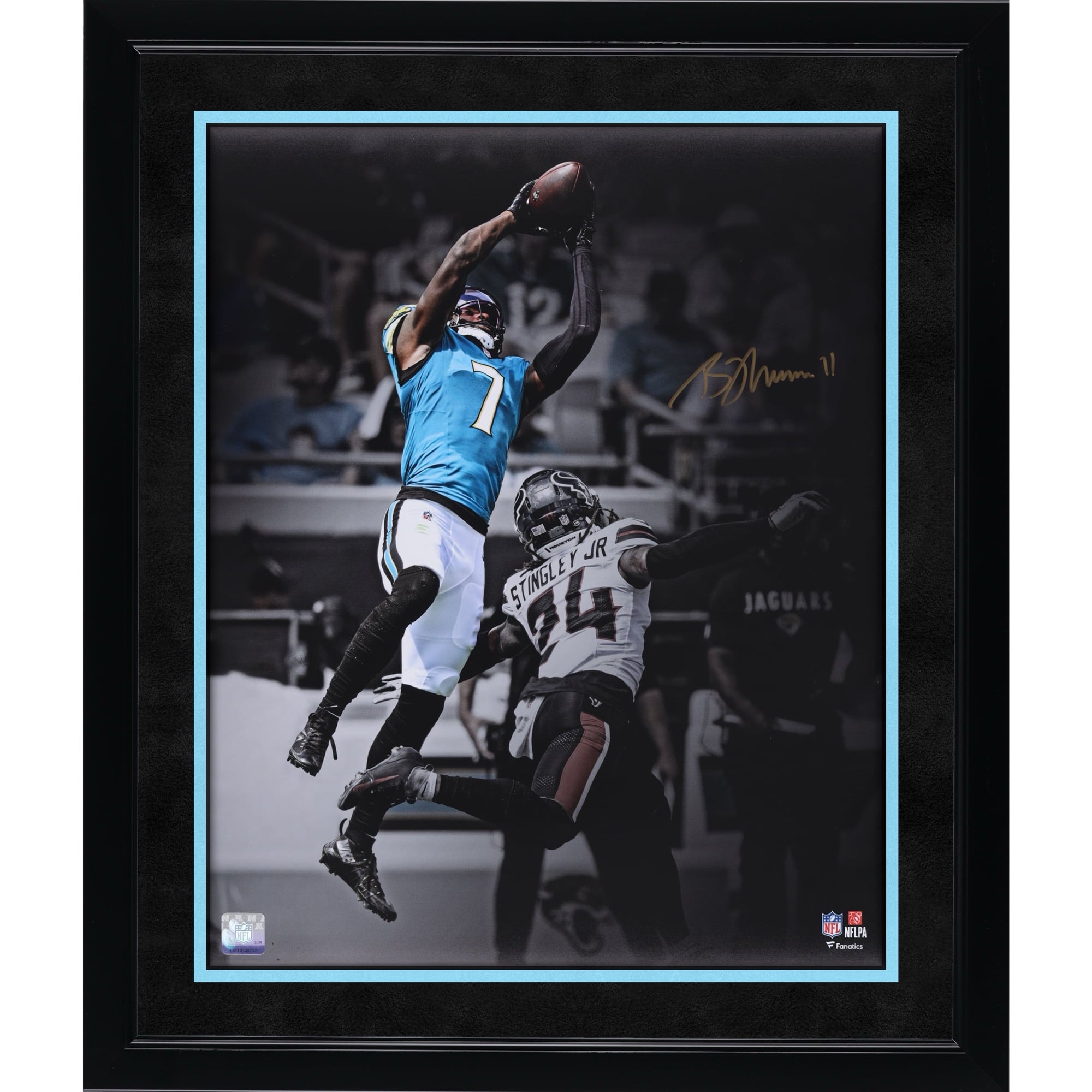 Brian Thomas Jr. Jacksonville Jaguars Autographed 16" x 20" Leaping Catch Spotlight Photograph