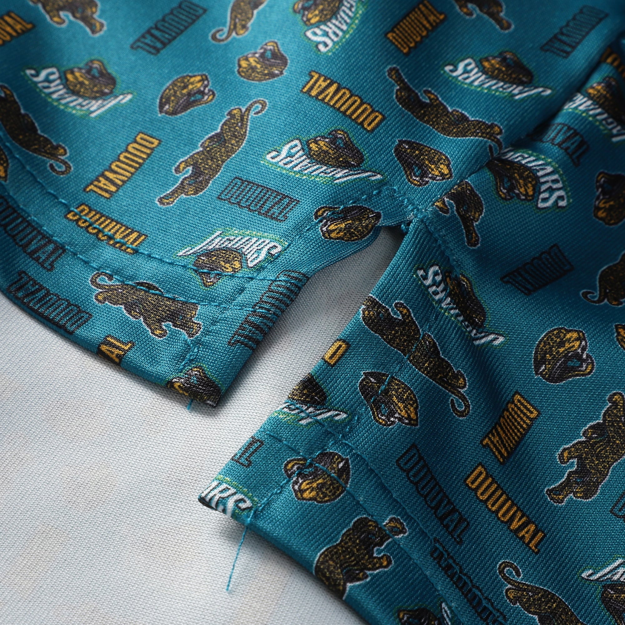 Polo Antigua bleu sarcelle pour homme, abonnements saisonniers aux Jaguars de Jacksonville