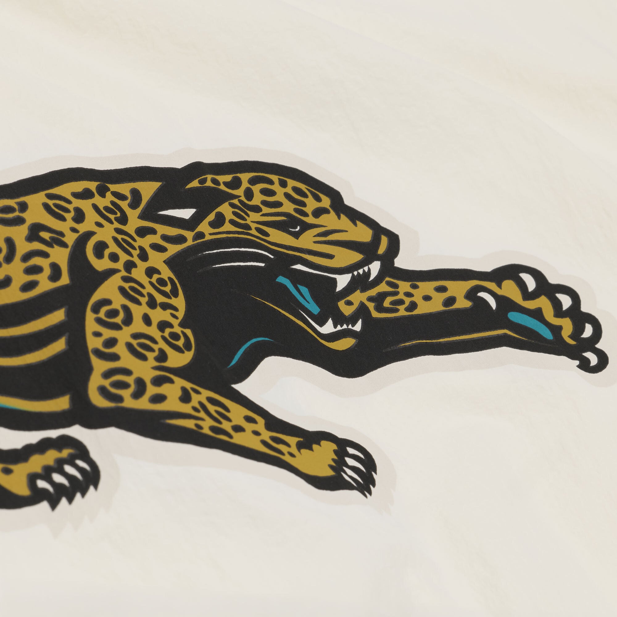 Veste d'entraîneur Mitchell & Ness crème Jacksonville Jaguars Retro Roots pour homme, fermeture à boutons-pression.