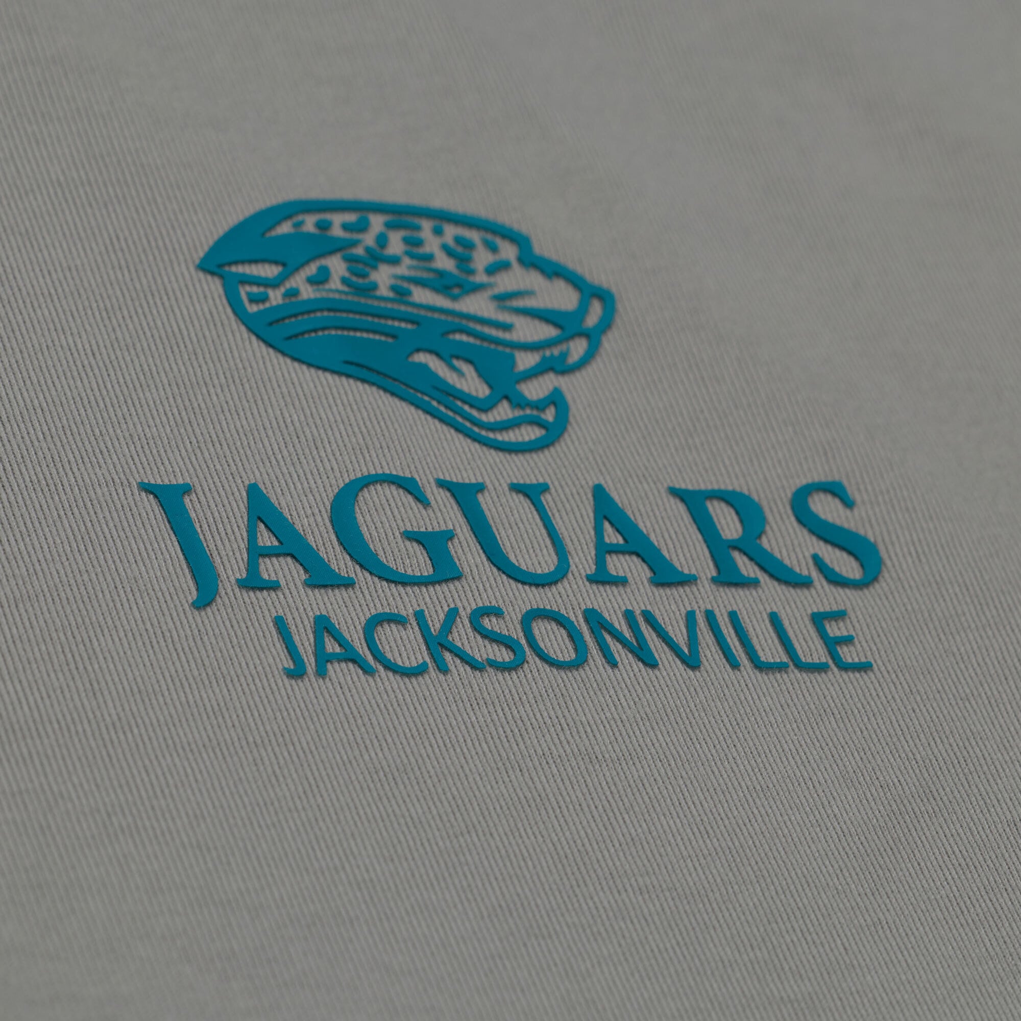 T-shirt Mitchell & Ness gris pour homme, modèle Core Essentials Micro Logo des Jaguars de Jacksonville