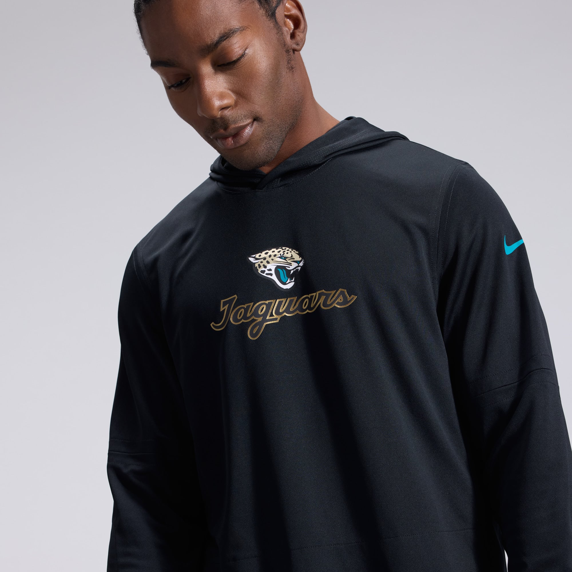 Men's Nike Black Jacksonville Jaguars 2026 Rivalries Collection Sideline Lightweight Hooded Long Sleeve Top