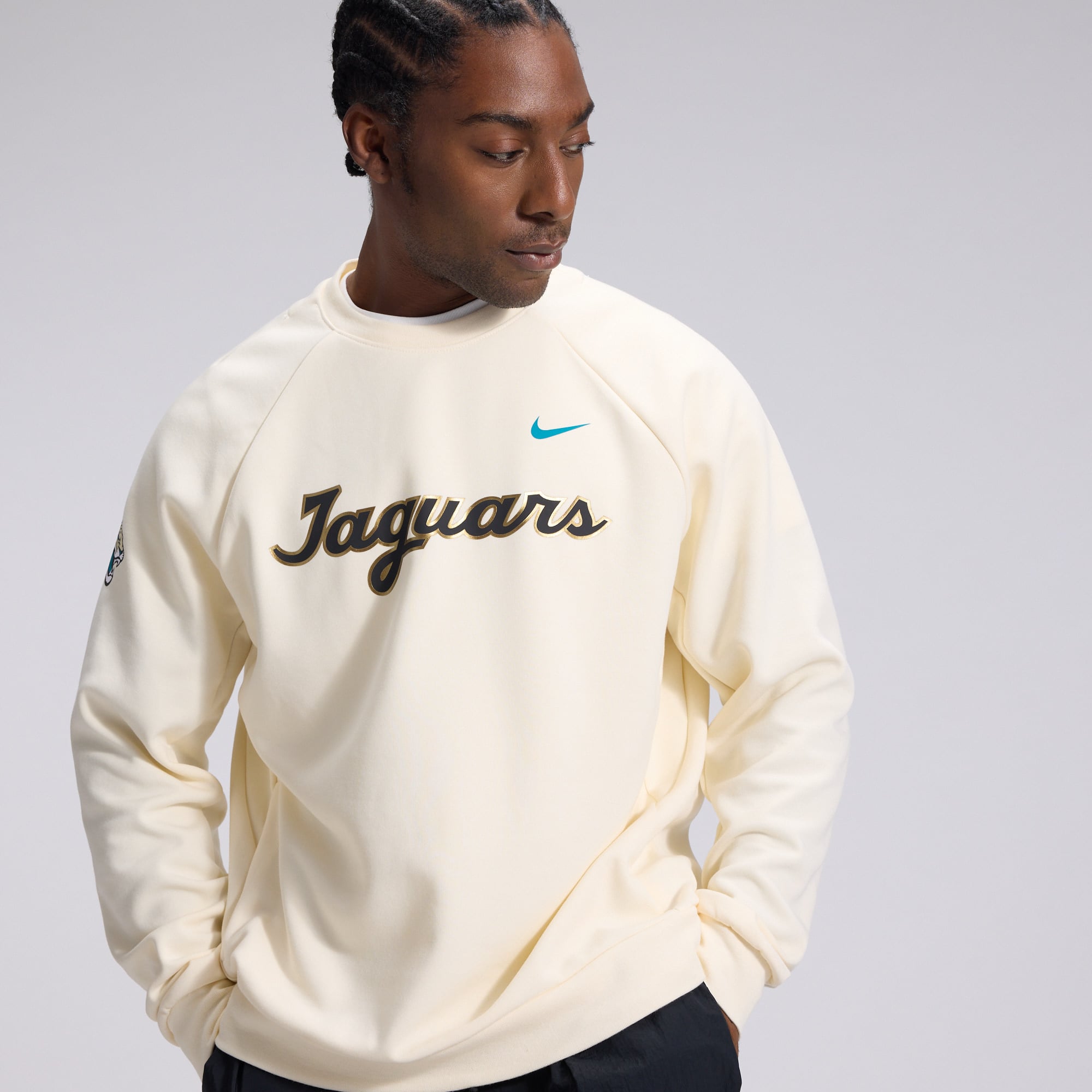 Men's Nike Natural Jacksonville Jaguars 2026 Rivalries Collection Dri-FIT Crew Sweatshirt