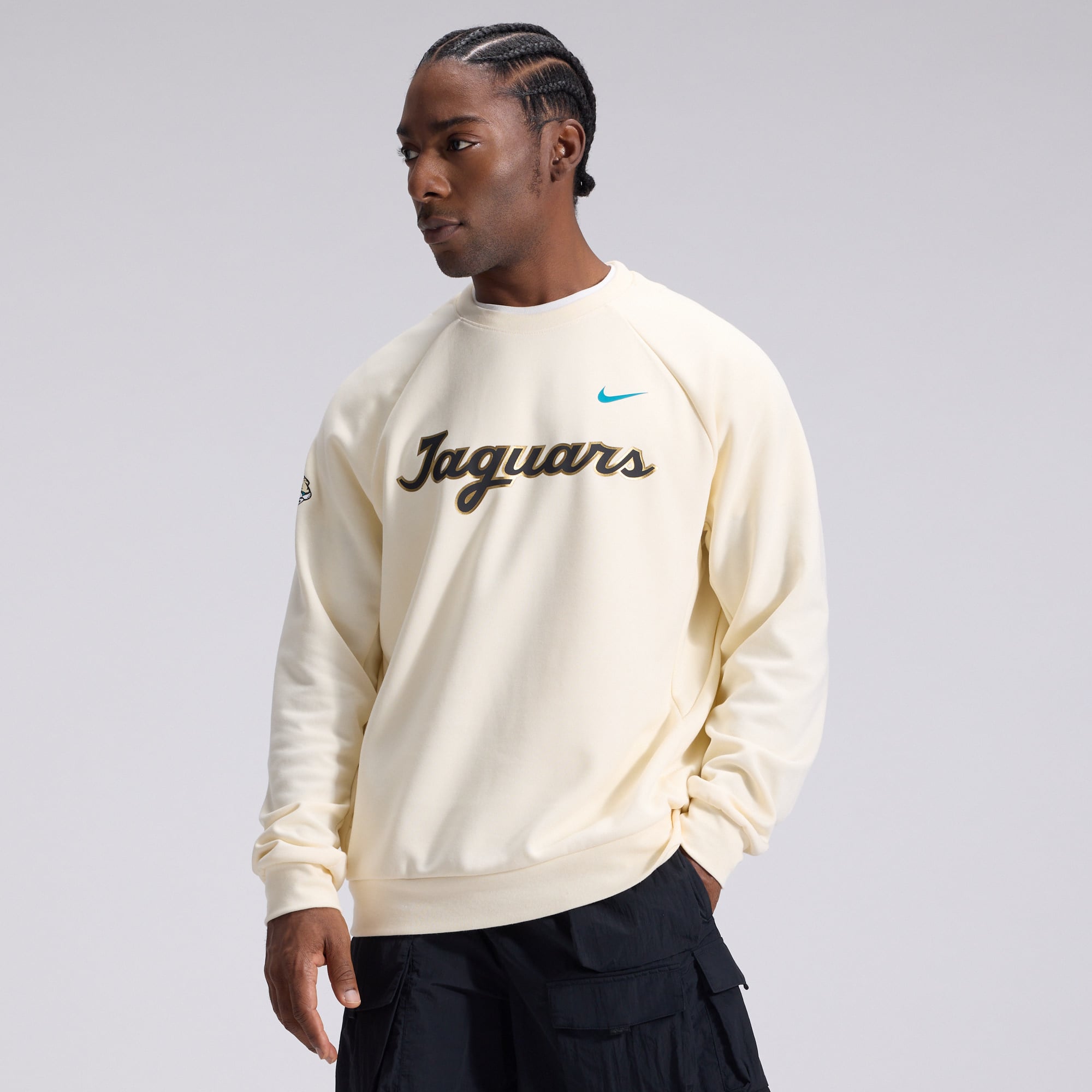 Men's Nike Natural Jacksonville Jaguars 2026 Rivalries Collection Dri-FIT Crew Sweatshirt