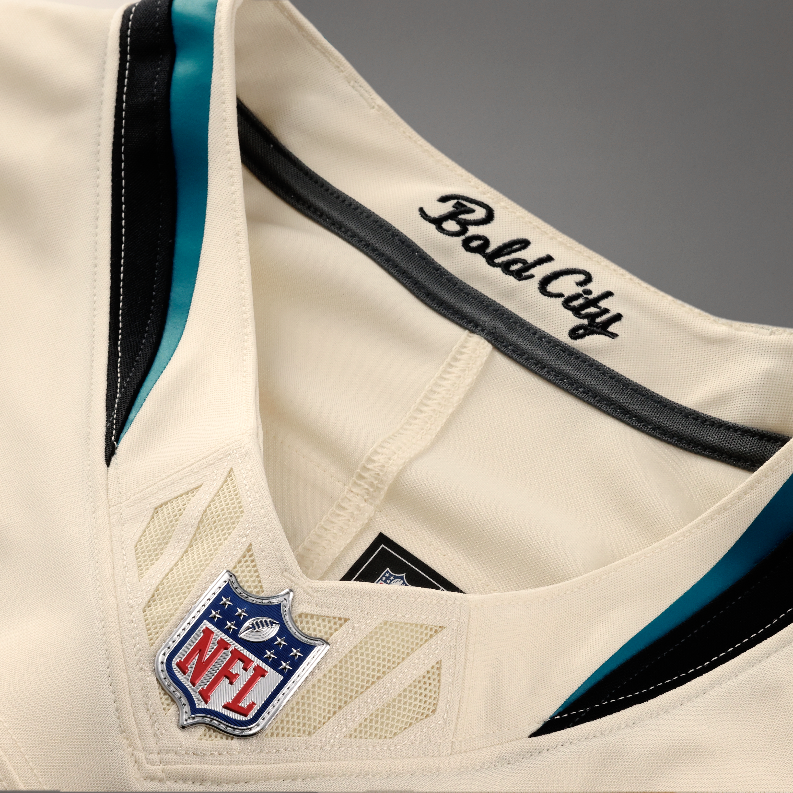 Men's Nike Travis Hunter Natural Jacksonville Jaguars 2026 Rivalries Collection Stitched Limited Jersey