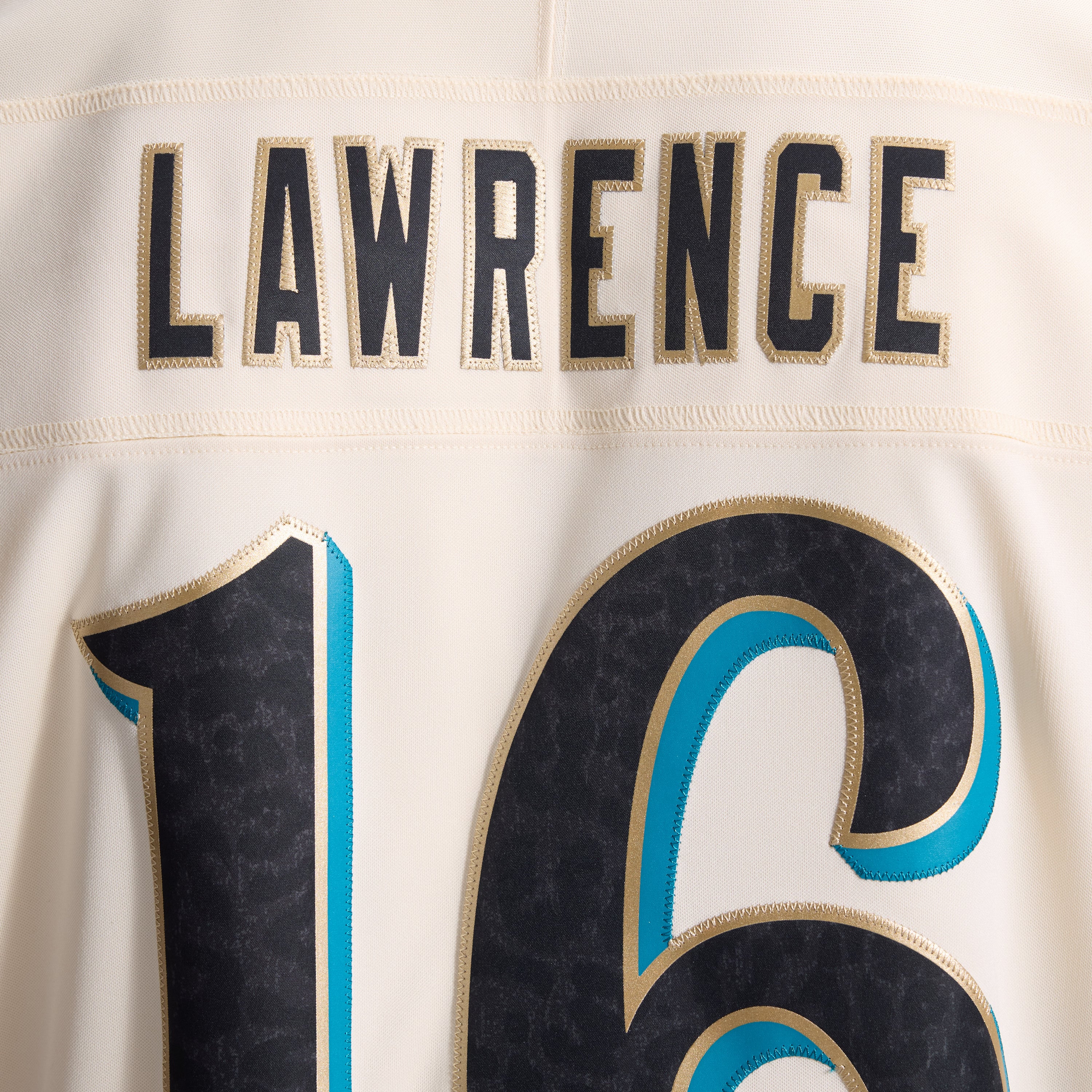 Men's Nike Trevor Lawrence Natural Jacksonville Jaguars 2026 Rivalries Collection Stitched Limited Jersey