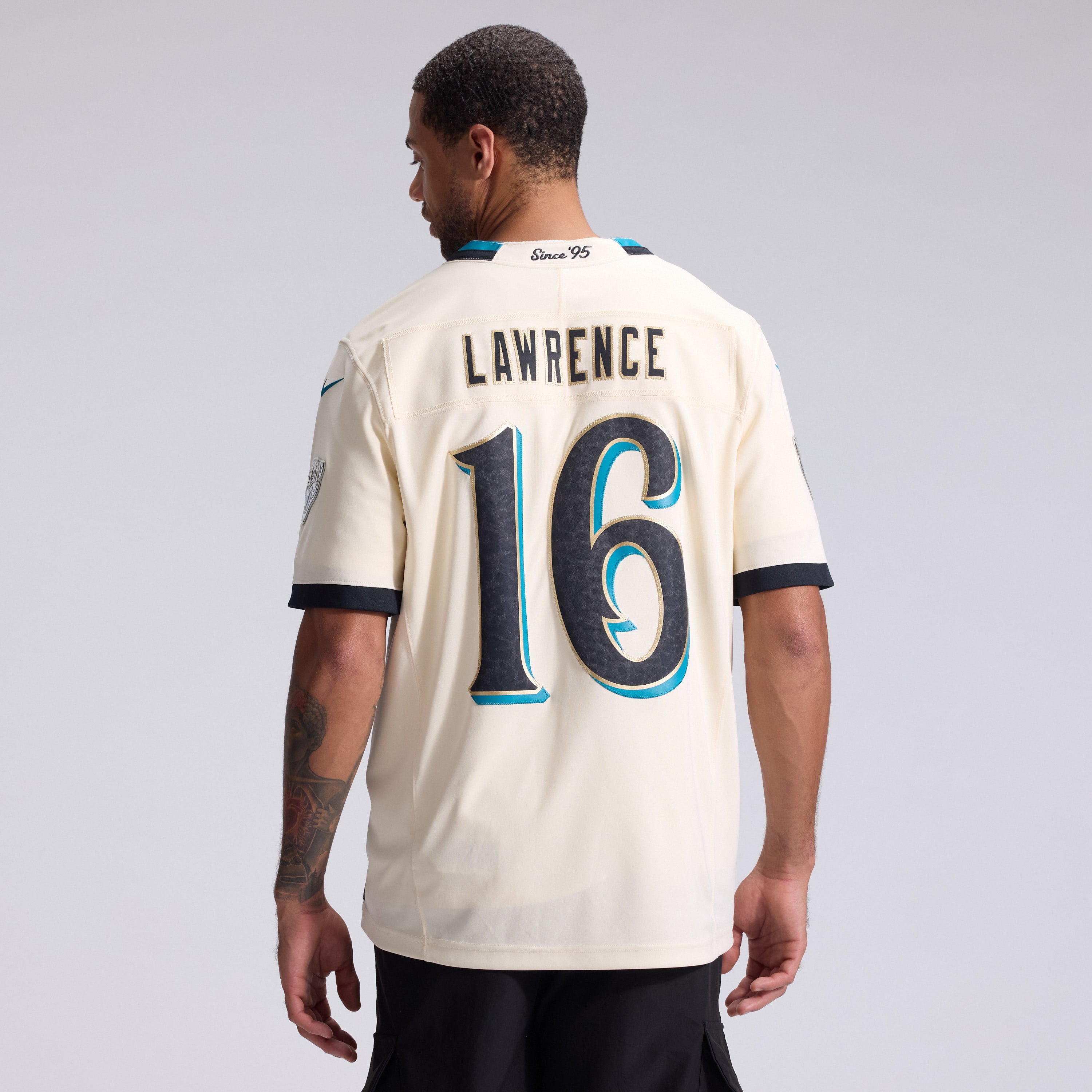 Men's Nike Trevor Lawrence Natural Jacksonville Jaguars 2026 Rivalries Collection Stitched Limited Jersey