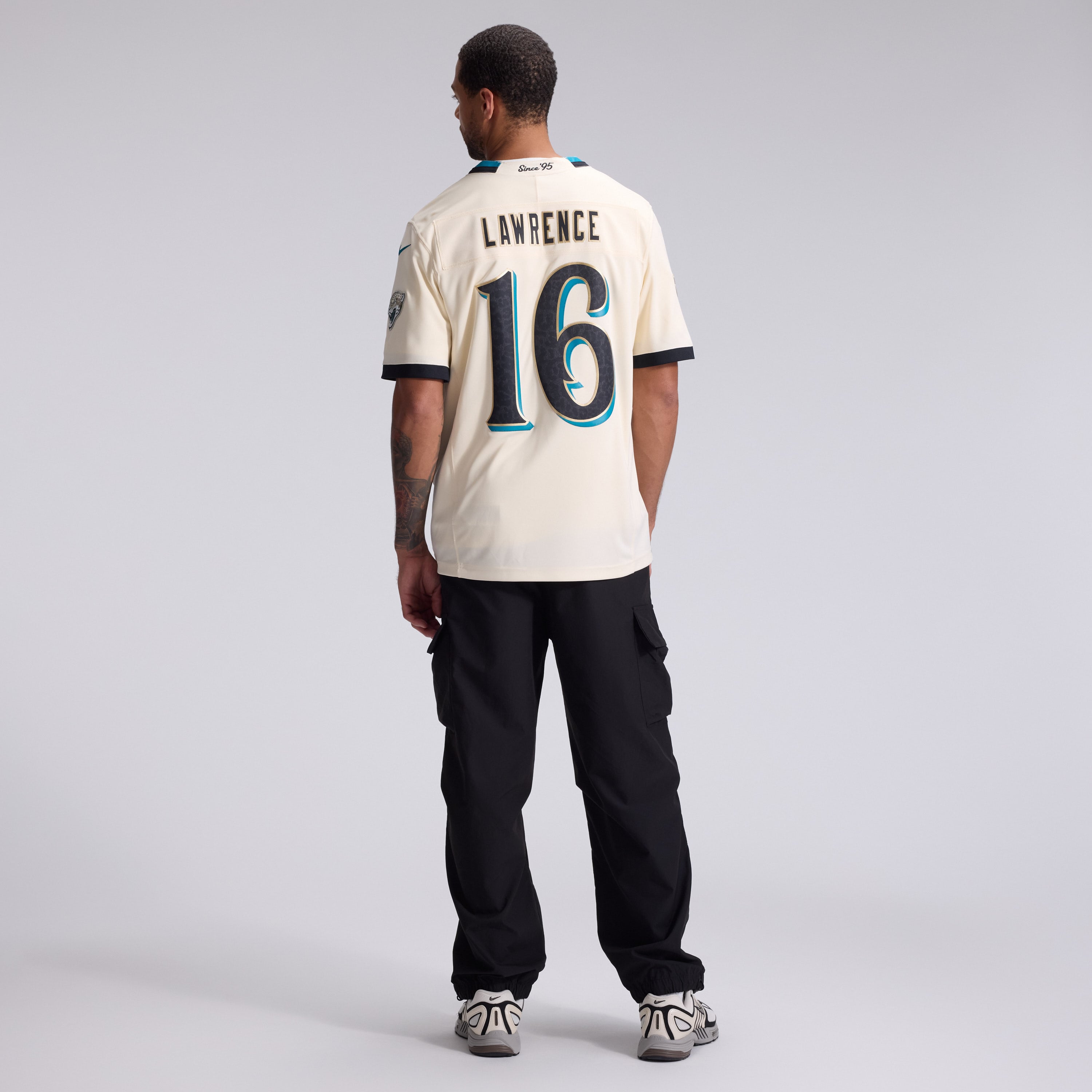 Men's Nike Trevor Lawrence Natural Jacksonville Jaguars 2026 Rivalries Collection Stitched Limited Jersey