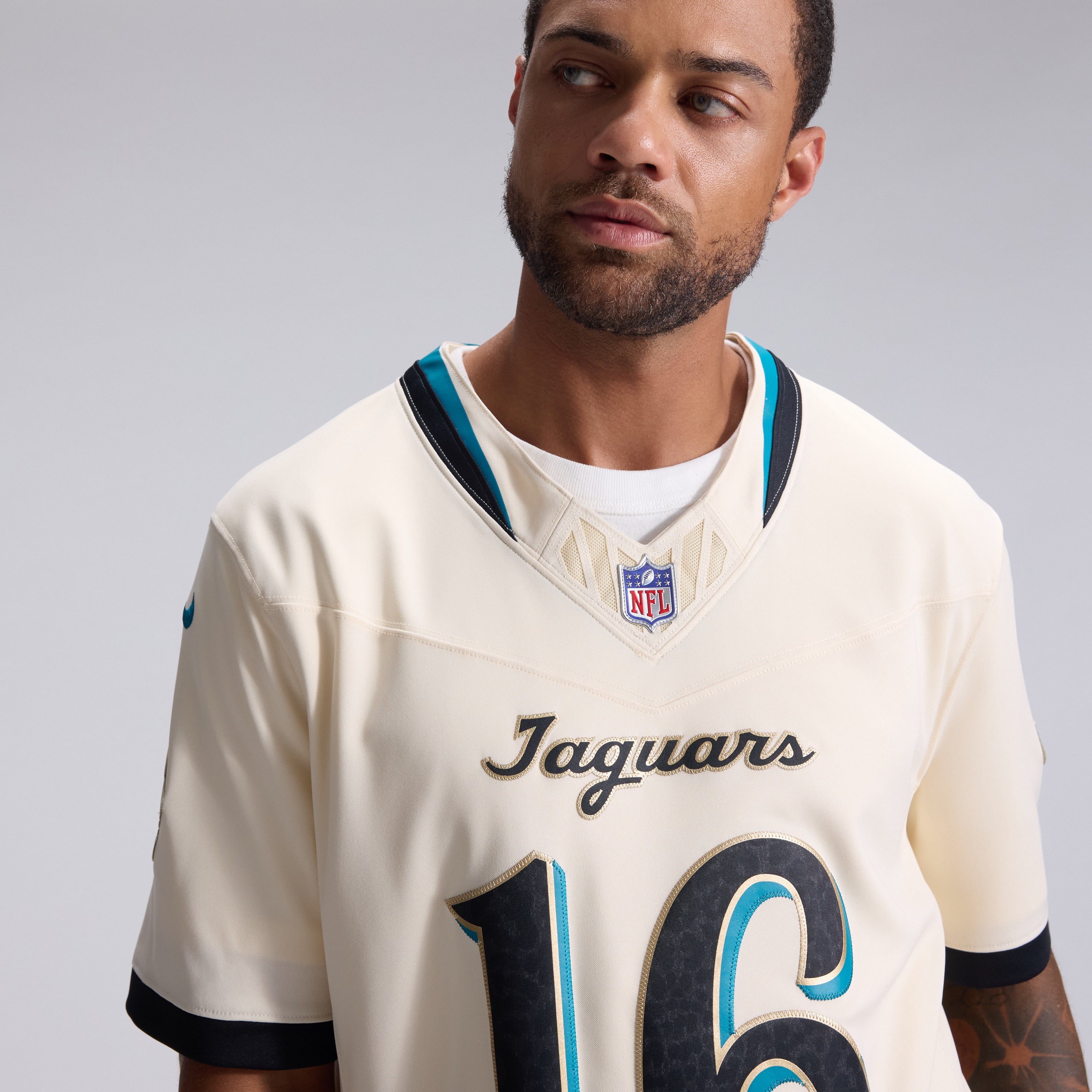 Men's Nike Trevor Lawrence Natural Jacksonville Jaguars 2026 Rivalries Collection Stitched Limited Jersey