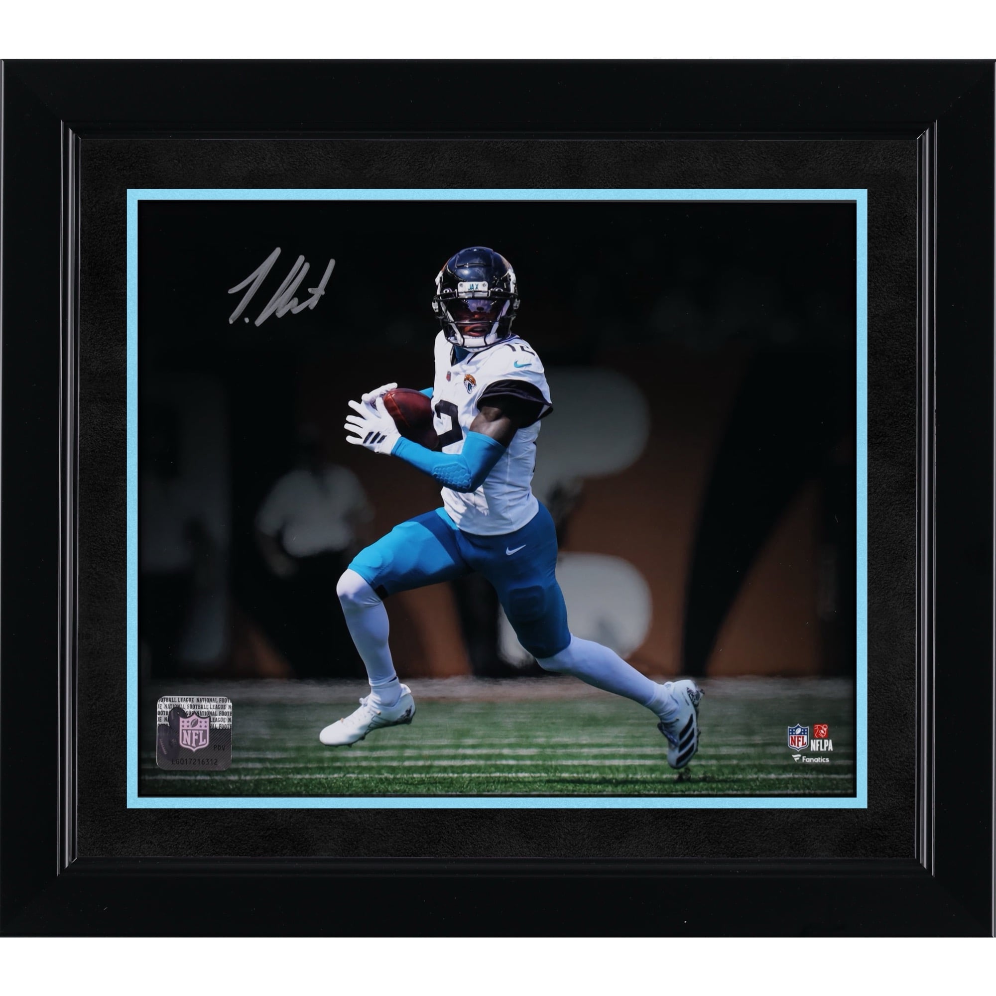 Travis Hunter Jacksonville Jaguars Autographed 8" x 10" White Jersey Running Spotlight Photograph