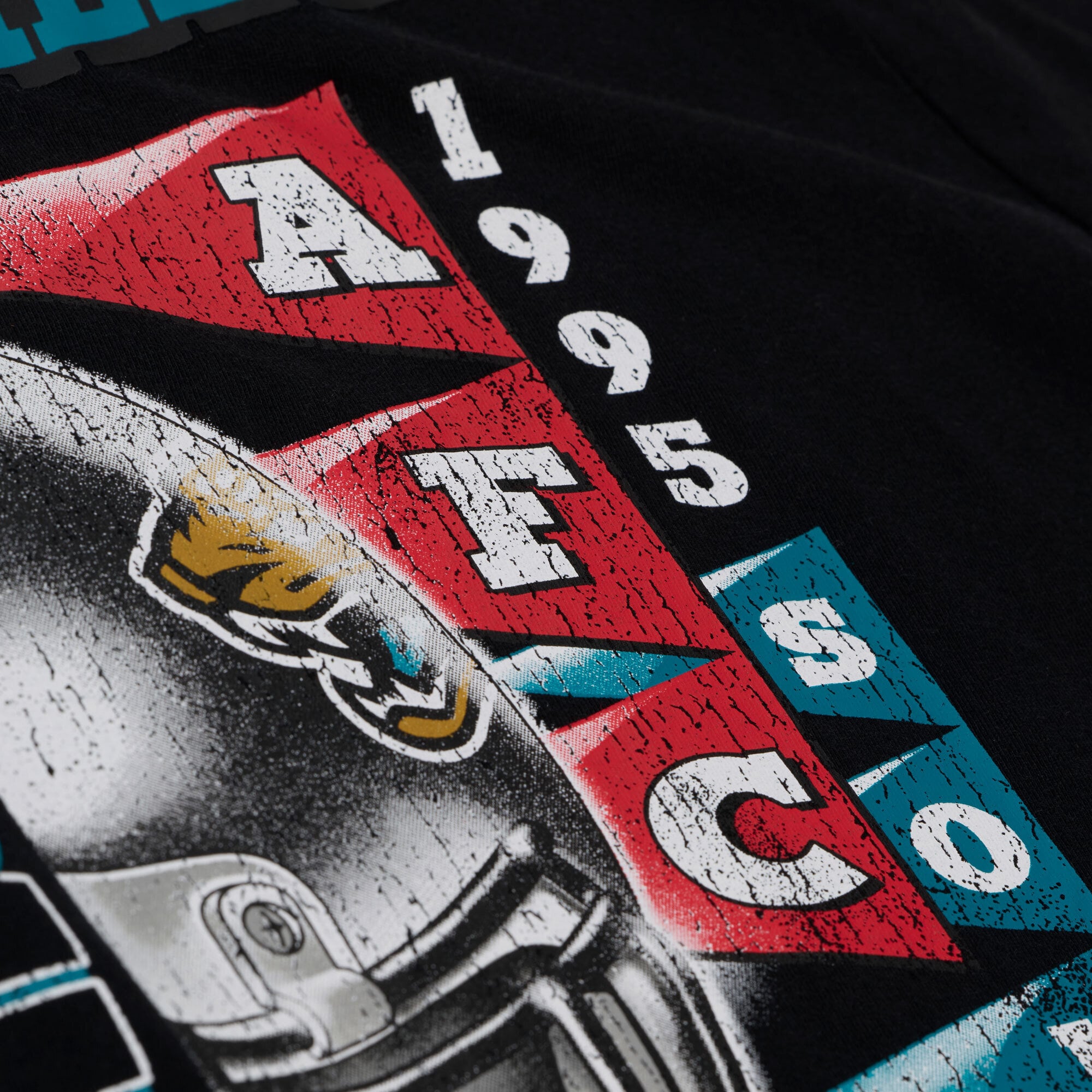 Women's Mitchell & Ness Black Jacksonville Jaguars Street Graphic Boxy Cropped T-Shirt