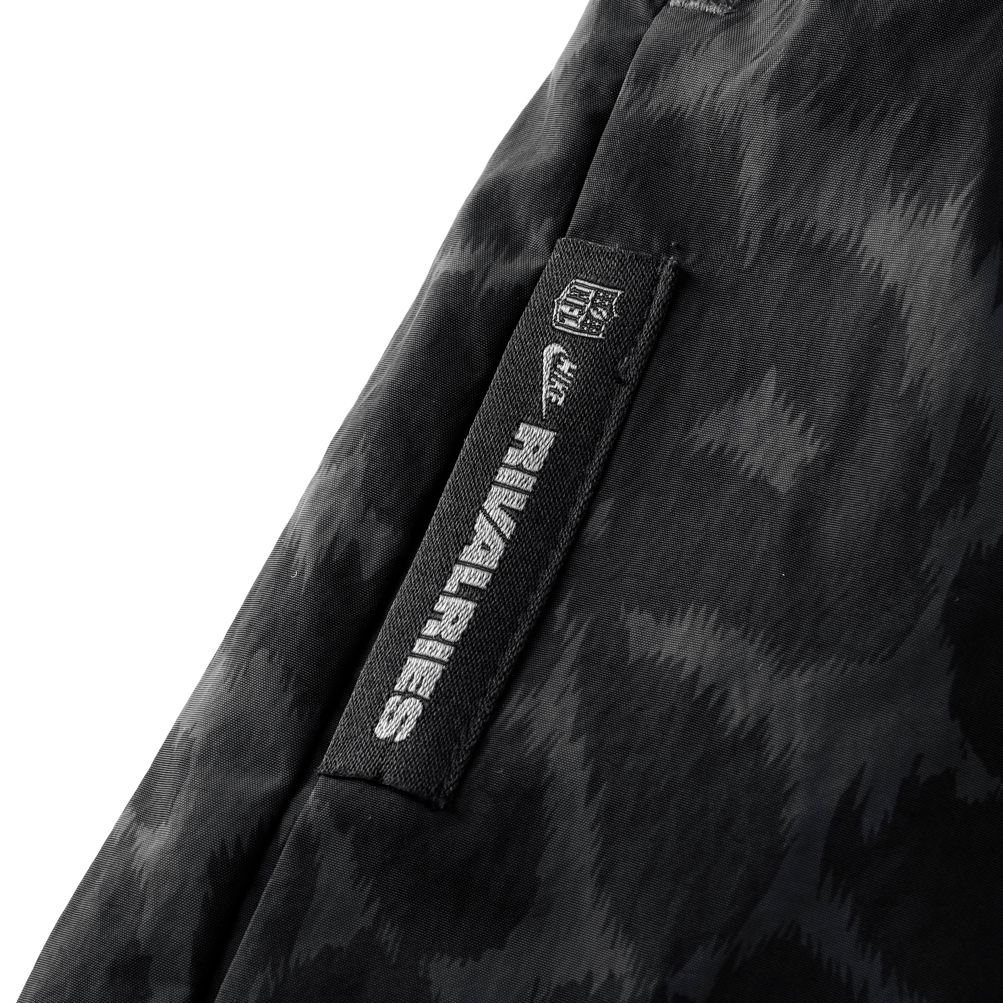 Pantalon tissé à jambes larges Nike pour femme, collection Rivalries 2026 des Jaguars de Jacksonville, noir