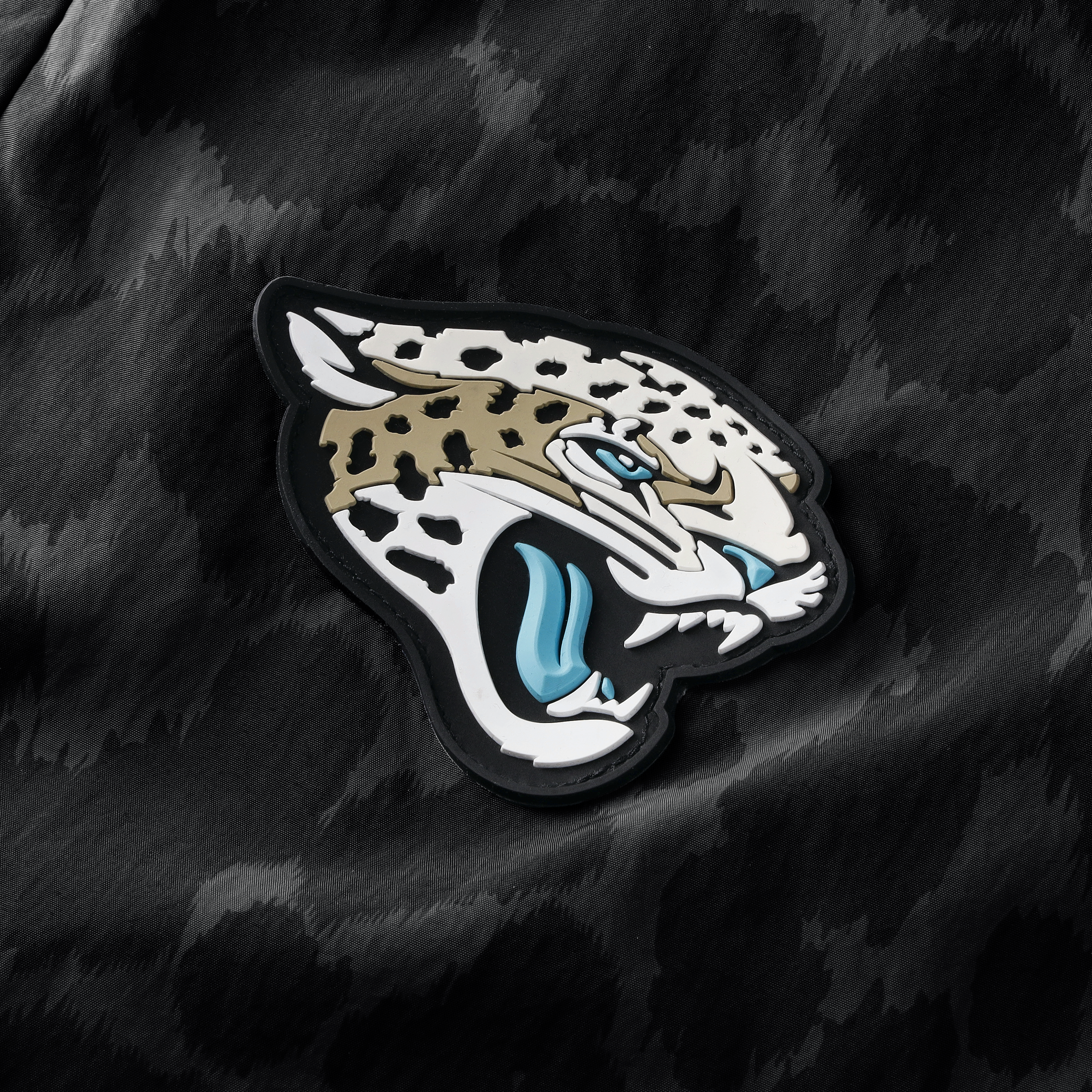 Pantalon tissé à jambes larges Nike pour femme, collection Rivalries 2026 des Jaguars de Jacksonville, noir