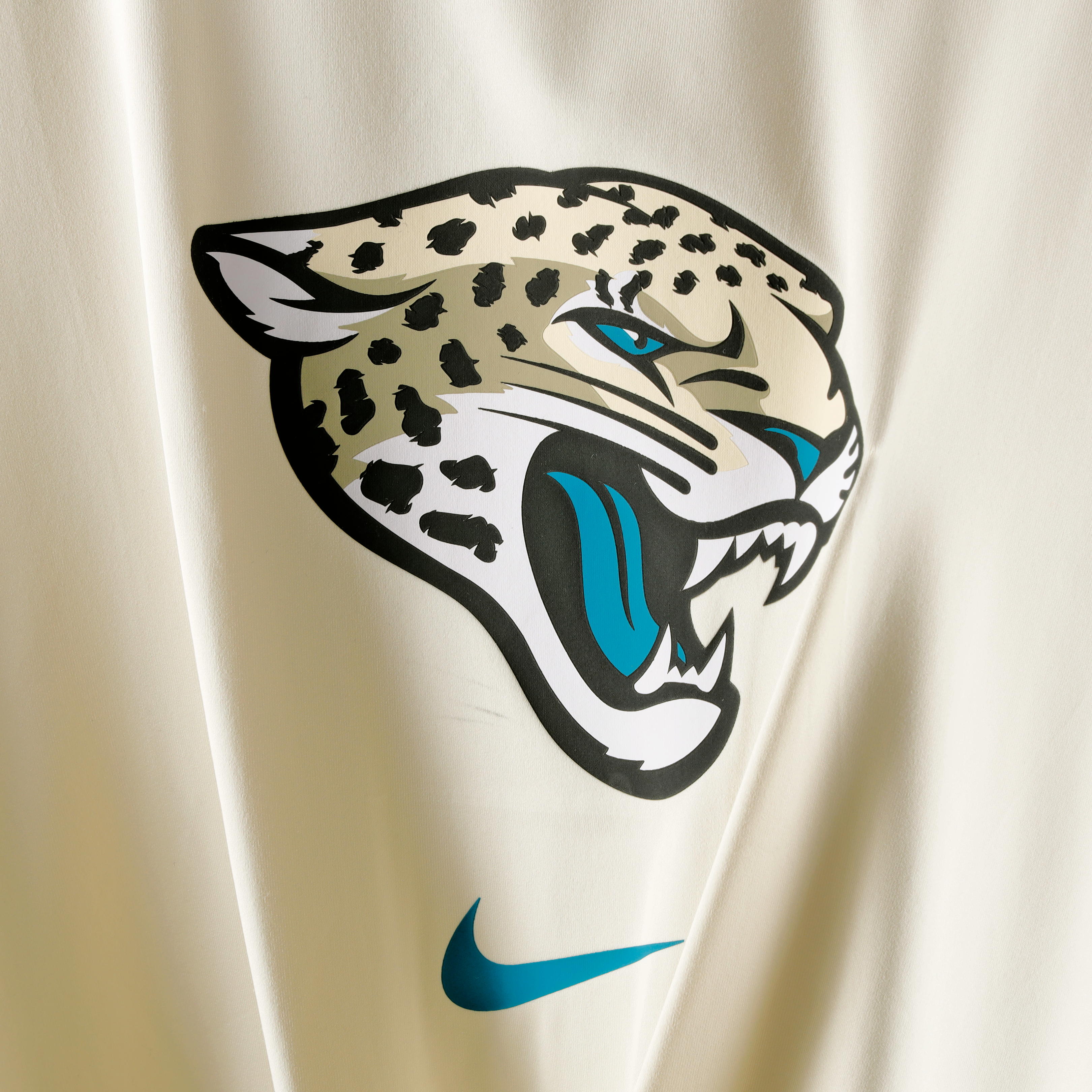 Women's Nike  Natural Jacksonville Jaguars 2026 Rivalries Collection Classic Twist Cropped T-Shirt