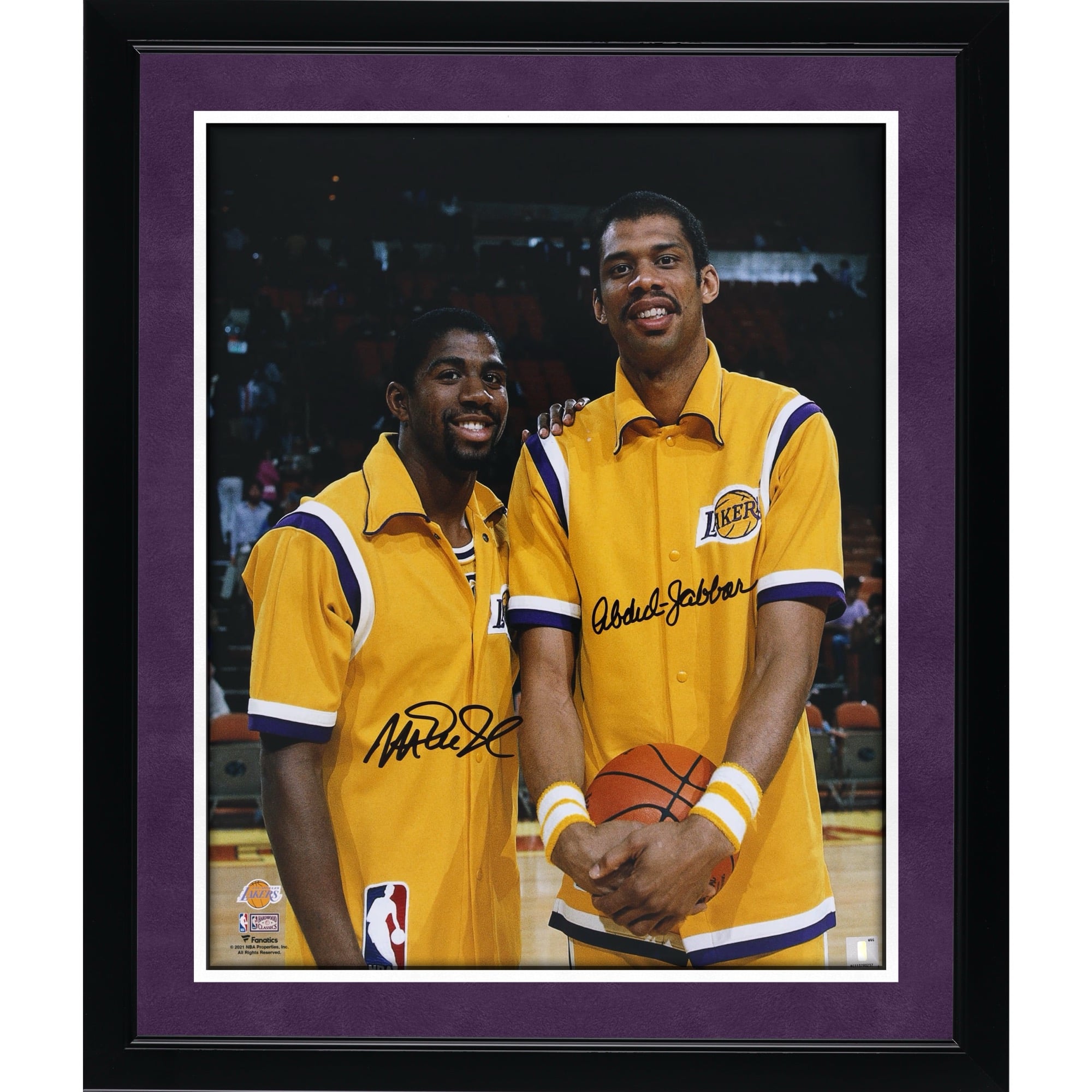 Magic Johnson & Kareem Abdul-Jabbar Los Angeles Lakers Autographed 16" x 20" Warm-ups Photograph